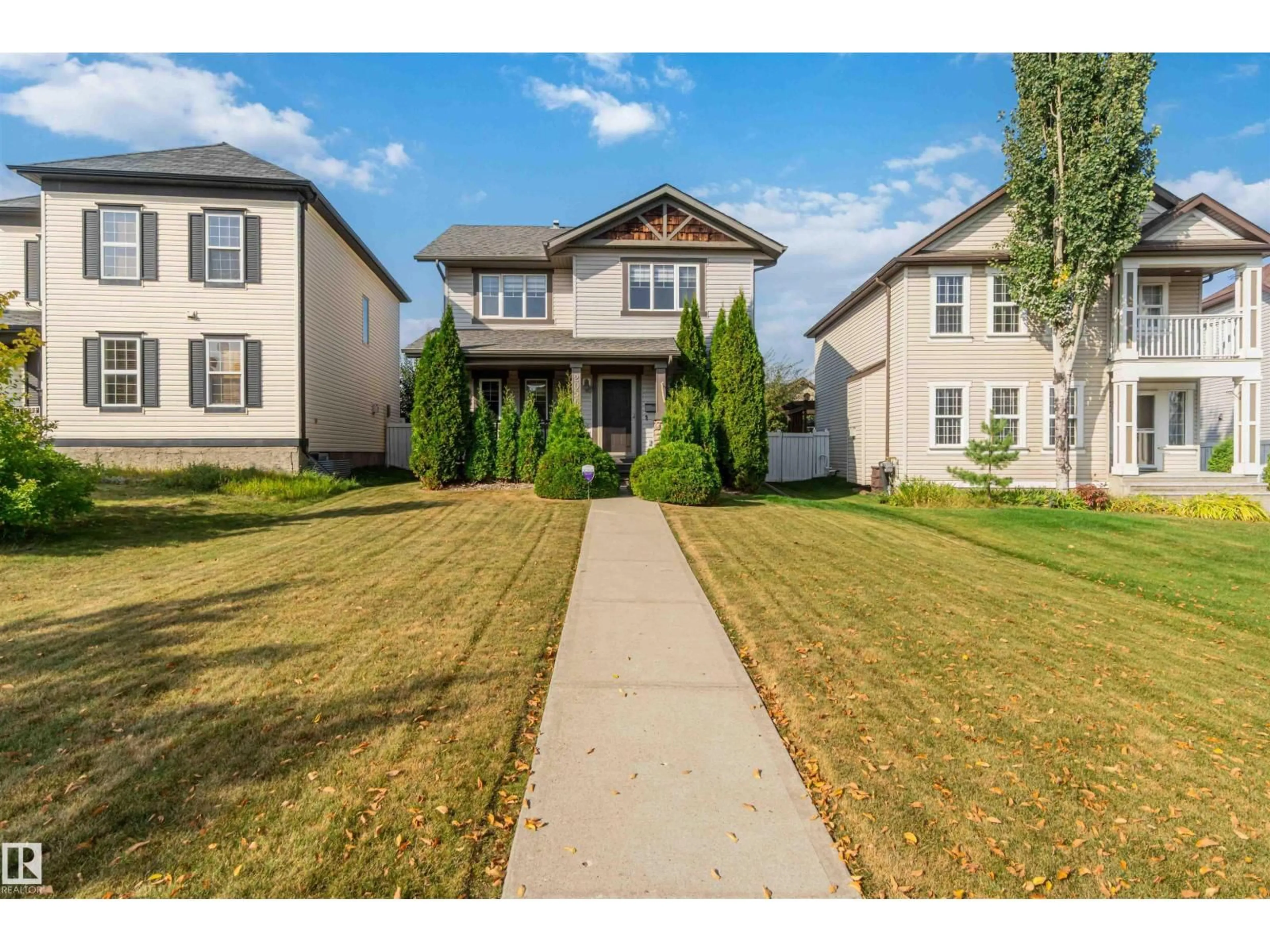 Home with vinyl exterior material, street for 2056 TOWNE CENTRE BV, Edmonton Alberta T6R3M7