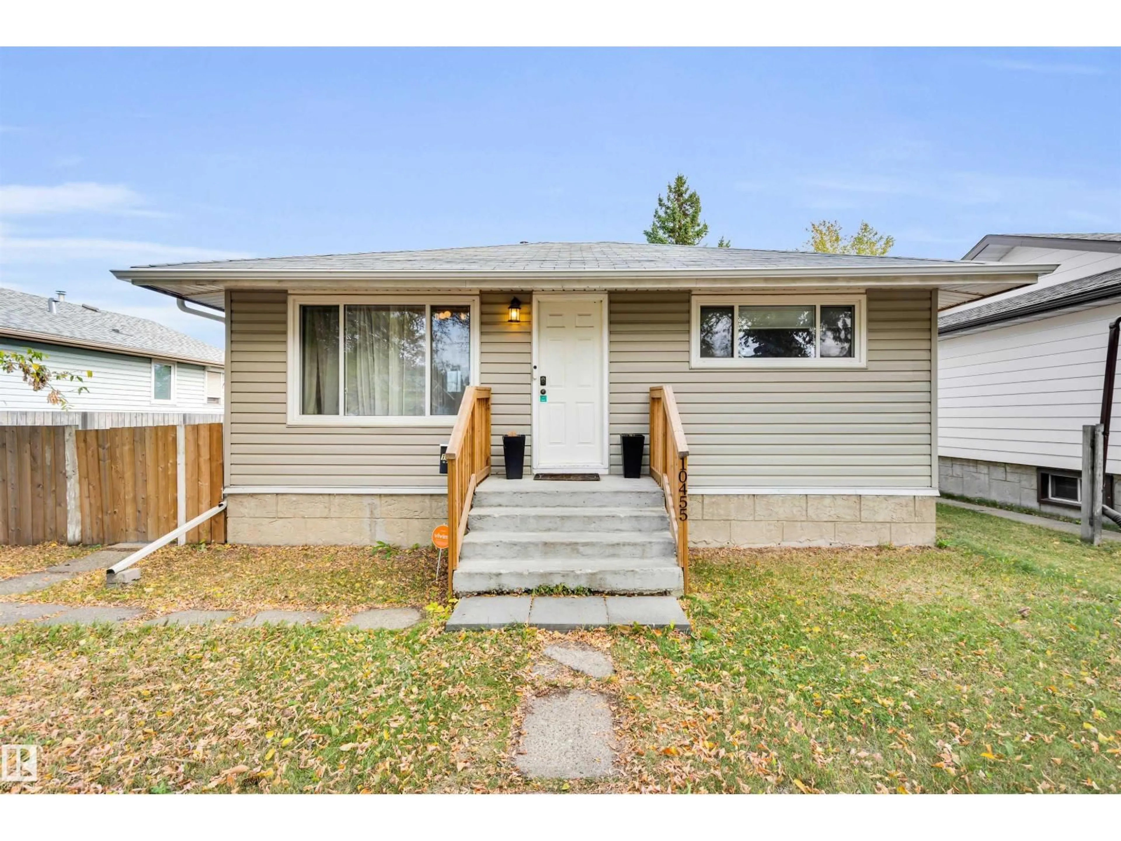 Home with vinyl exterior material, street for NW - 10455 163 ST, Edmonton Alberta T5P3N9