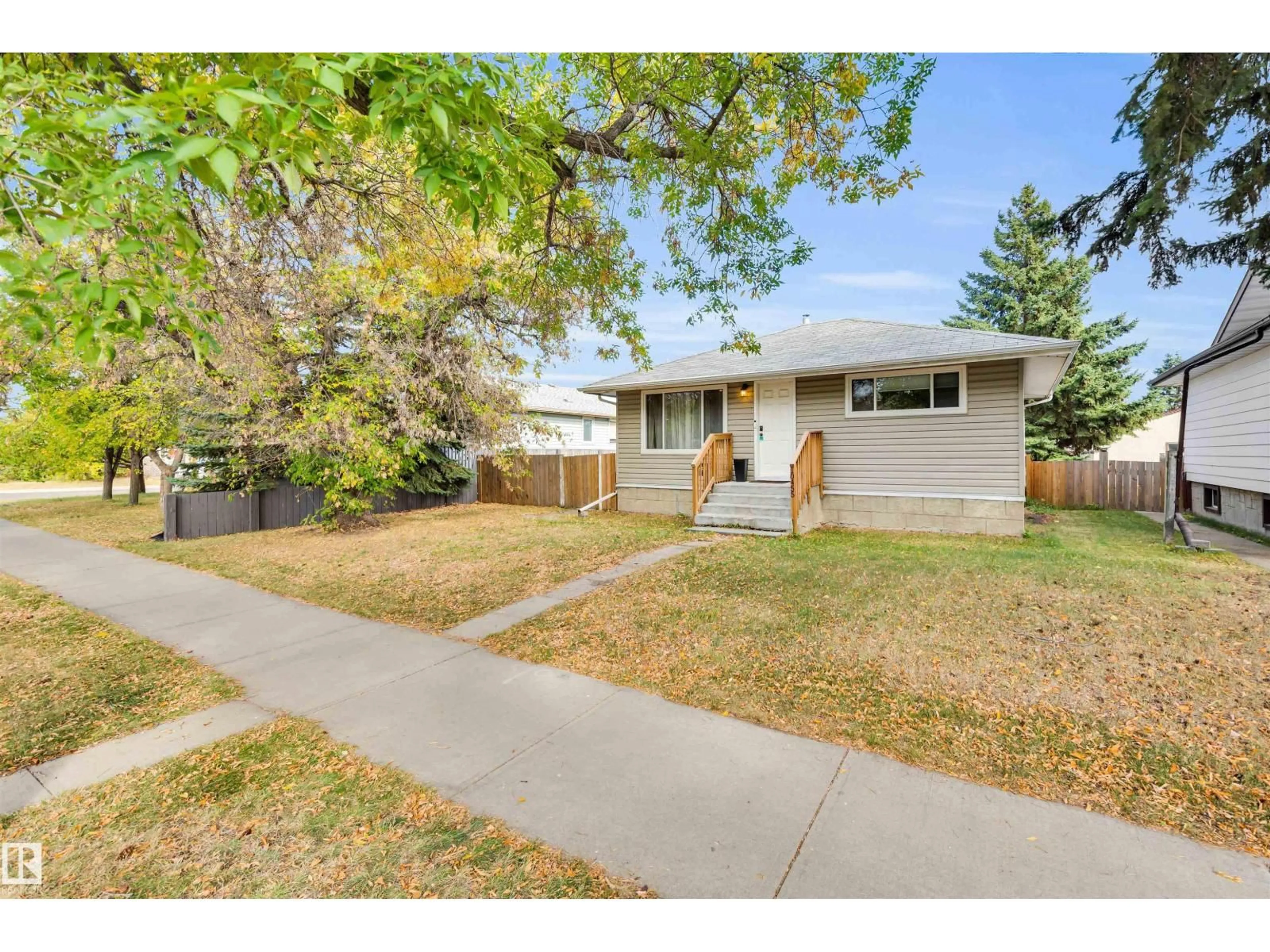 Home with vinyl exterior material, street for NW - 10455 163 ST, Edmonton Alberta T5P3N9