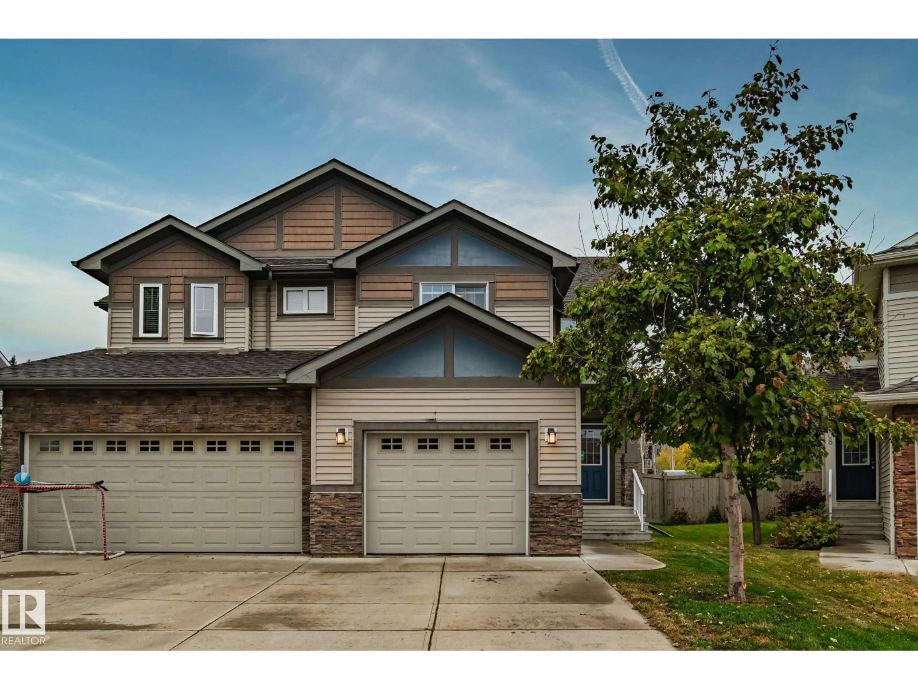 Home with vinyl exterior material, street for 13410 166 AV, Edmonton Alberta T6V0G6