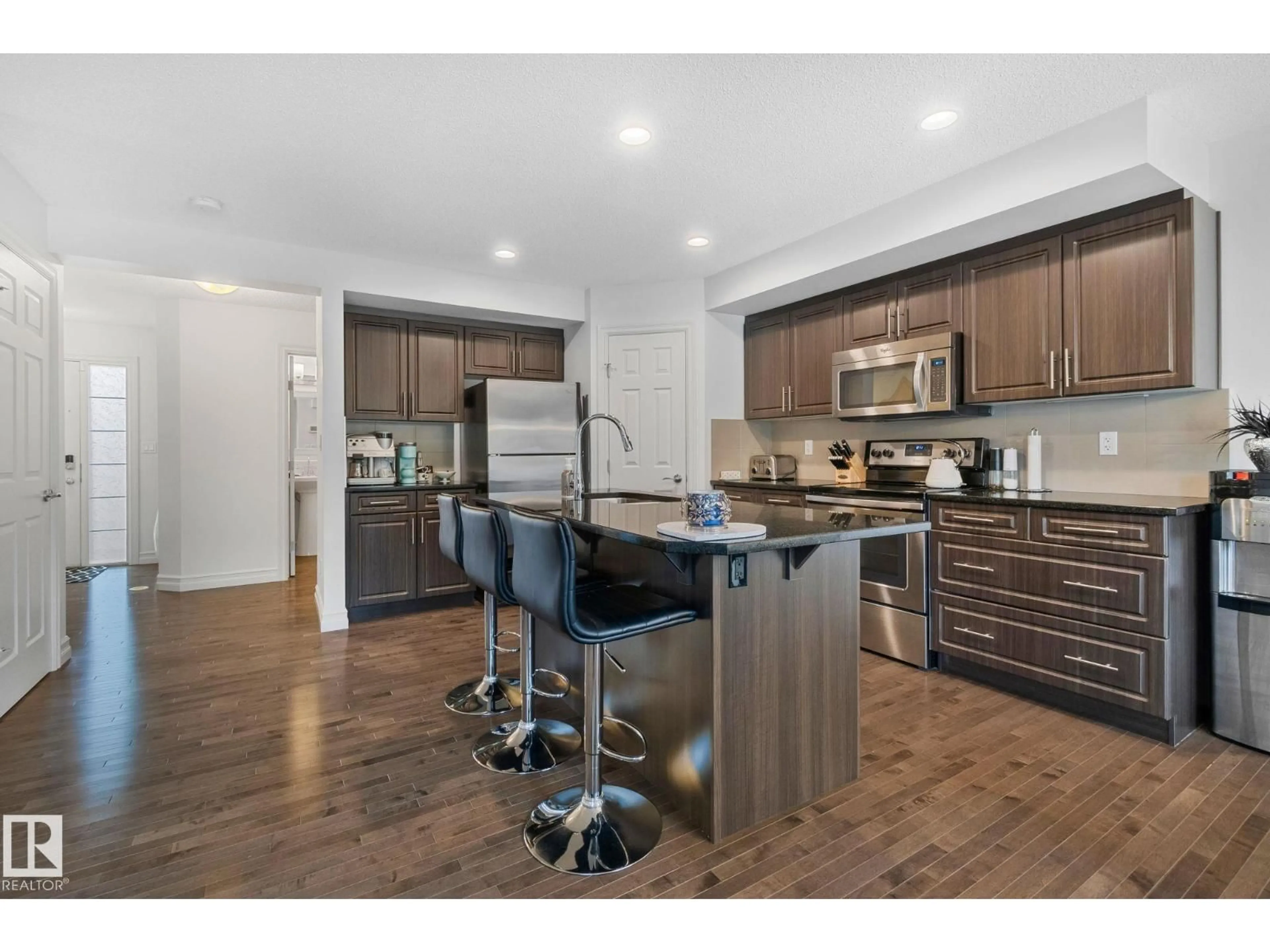 Open concept kitchen, wood/laminate floor for 13410 166 AV, Edmonton Alberta T6V0G6