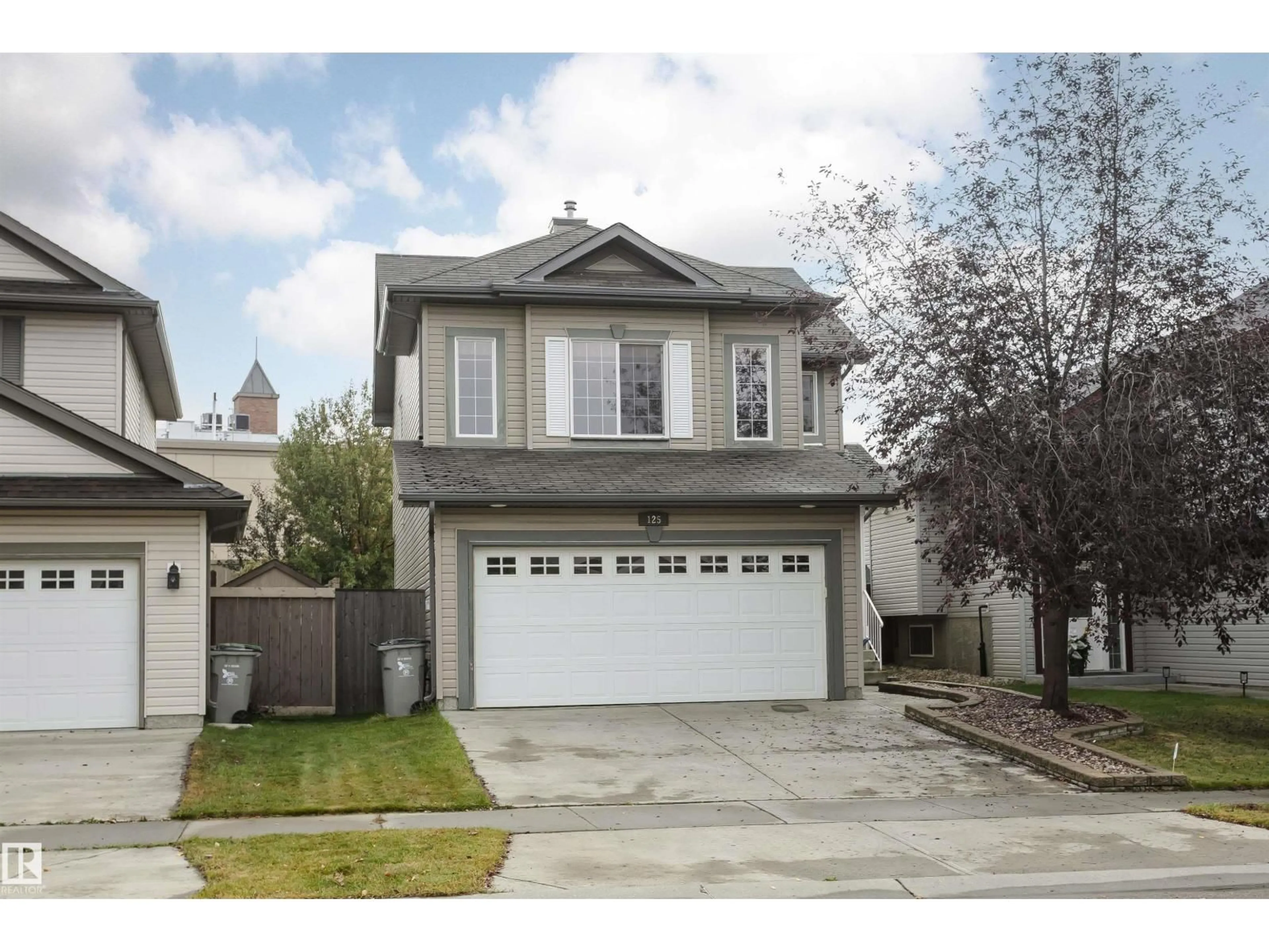 Home with vinyl exterior material, street for 125 RUE MASSON, Beaumont Alberta T4X1S8