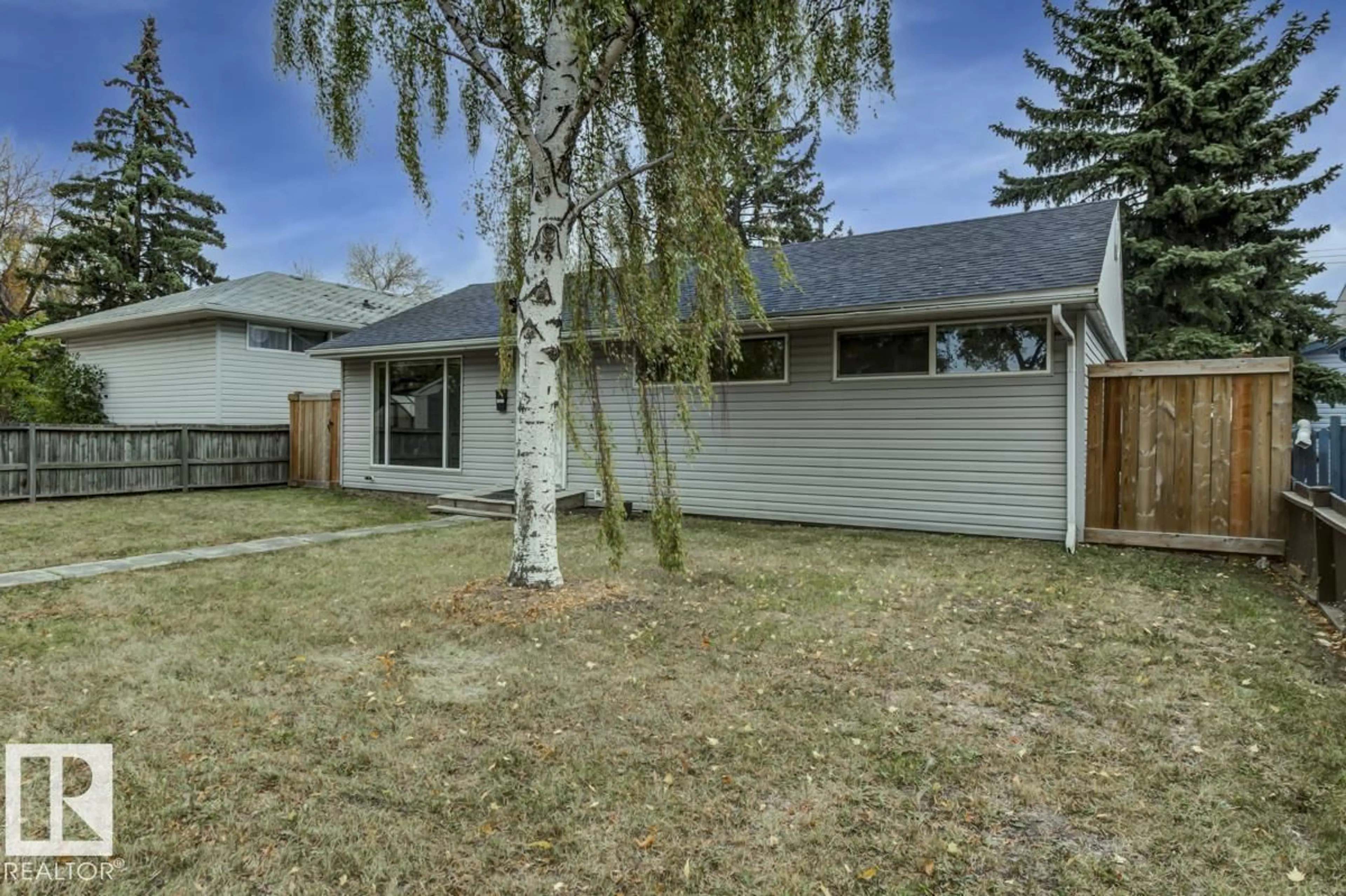 Home with vinyl exterior material, street for NW - 10971 159 ST, Edmonton Alberta T5P3B9