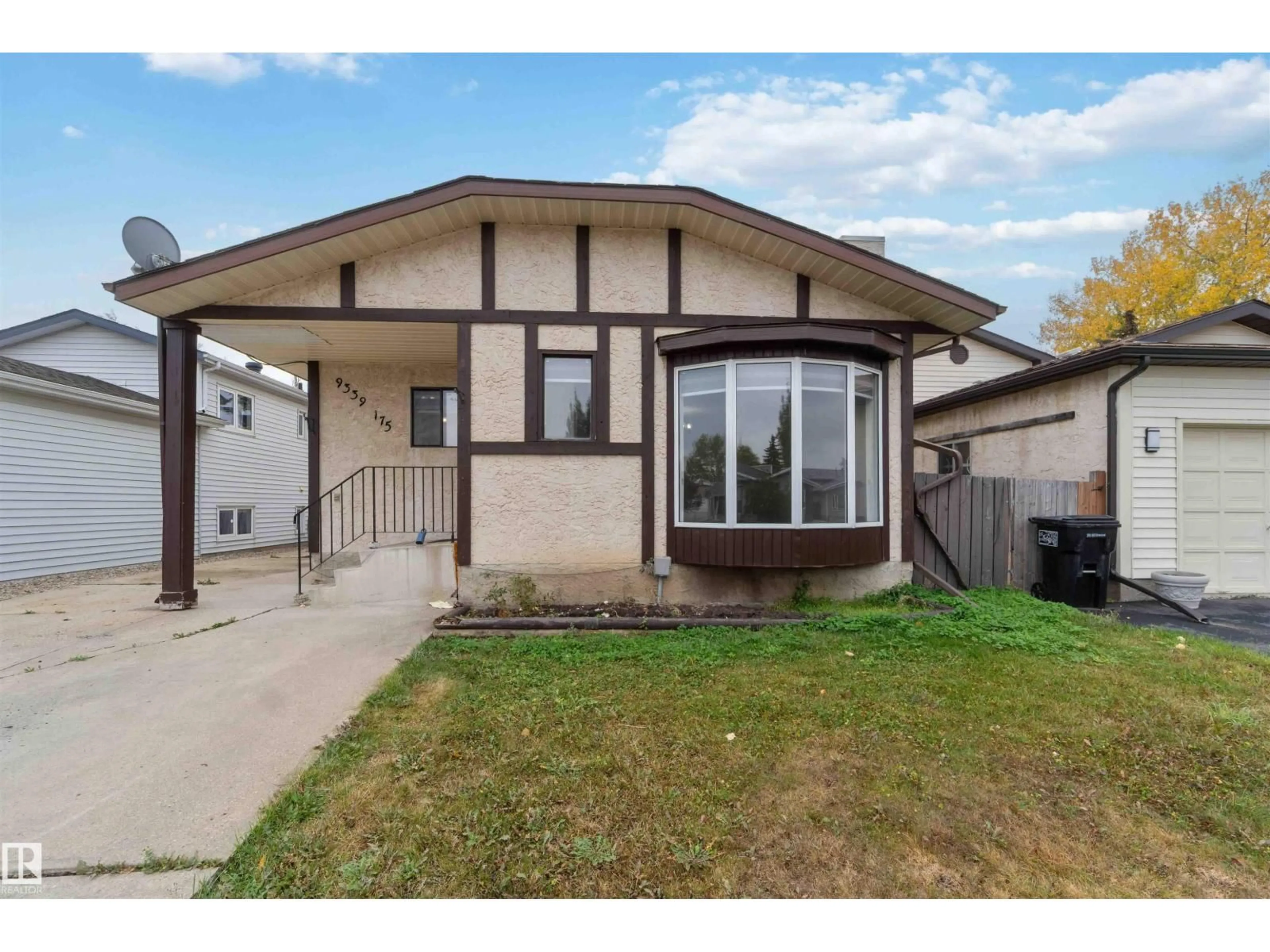 Home with vinyl exterior material, street for 9339 175 AV, Edmonton Alberta T5Z2C7