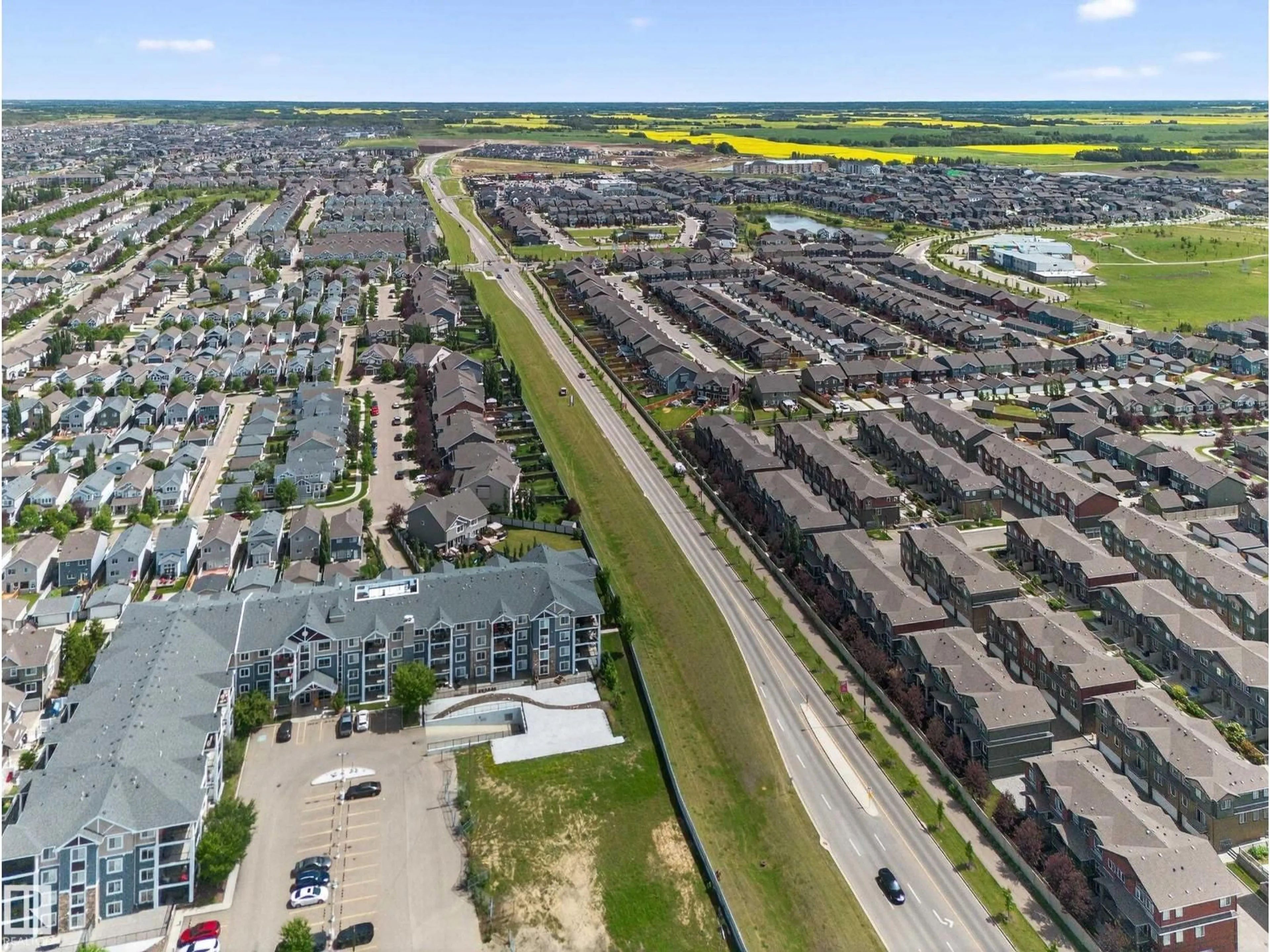 A pic from outside/outdoor area/front of a property/back of a property/a pic from drone, street for #133 - 3305 ORCHARDS LINK LI, Edmonton Alberta T6X2H1