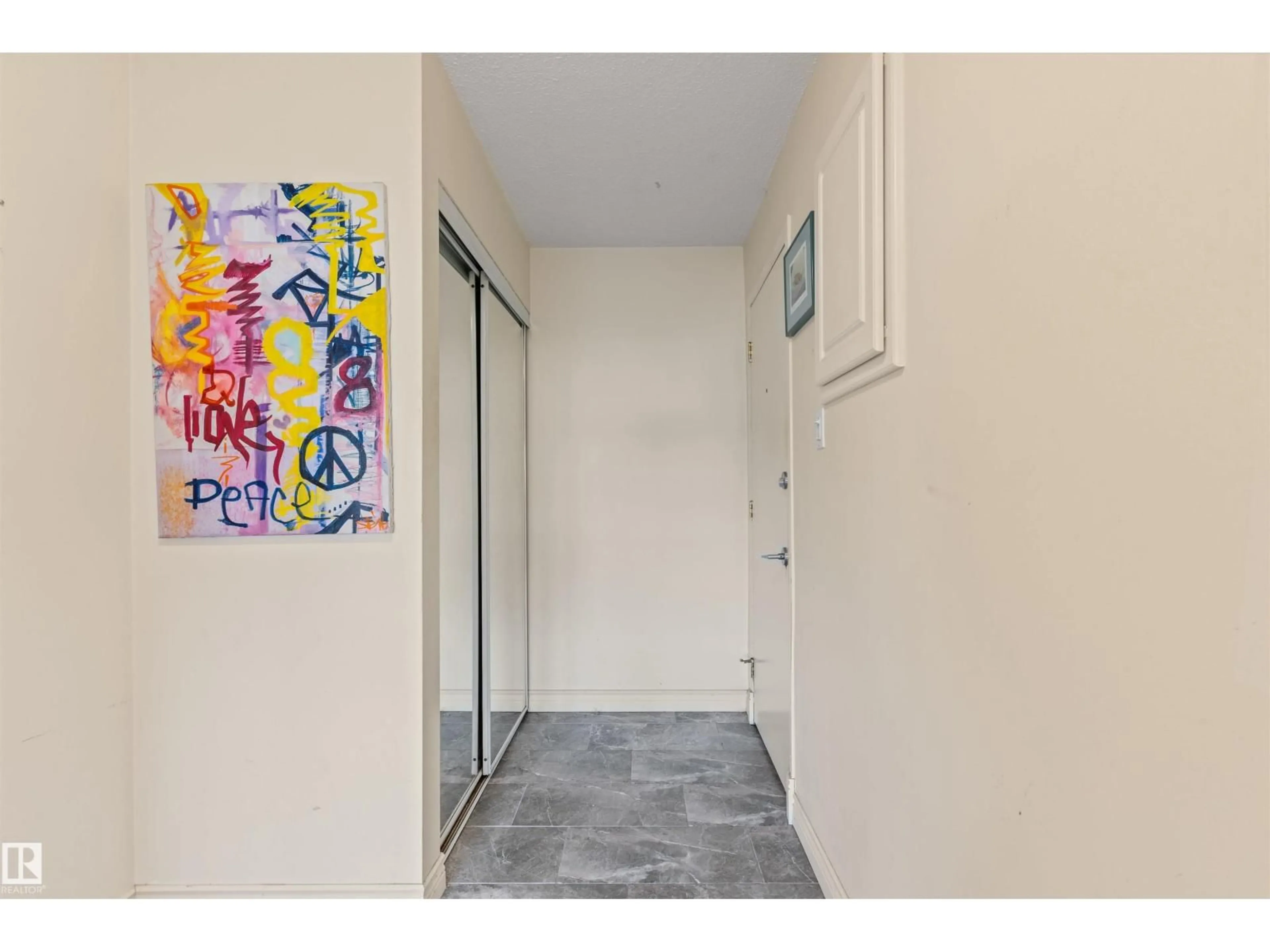 Indoor entryway for #104 - 7816 106 AV, Edmonton Alberta T6A1H5