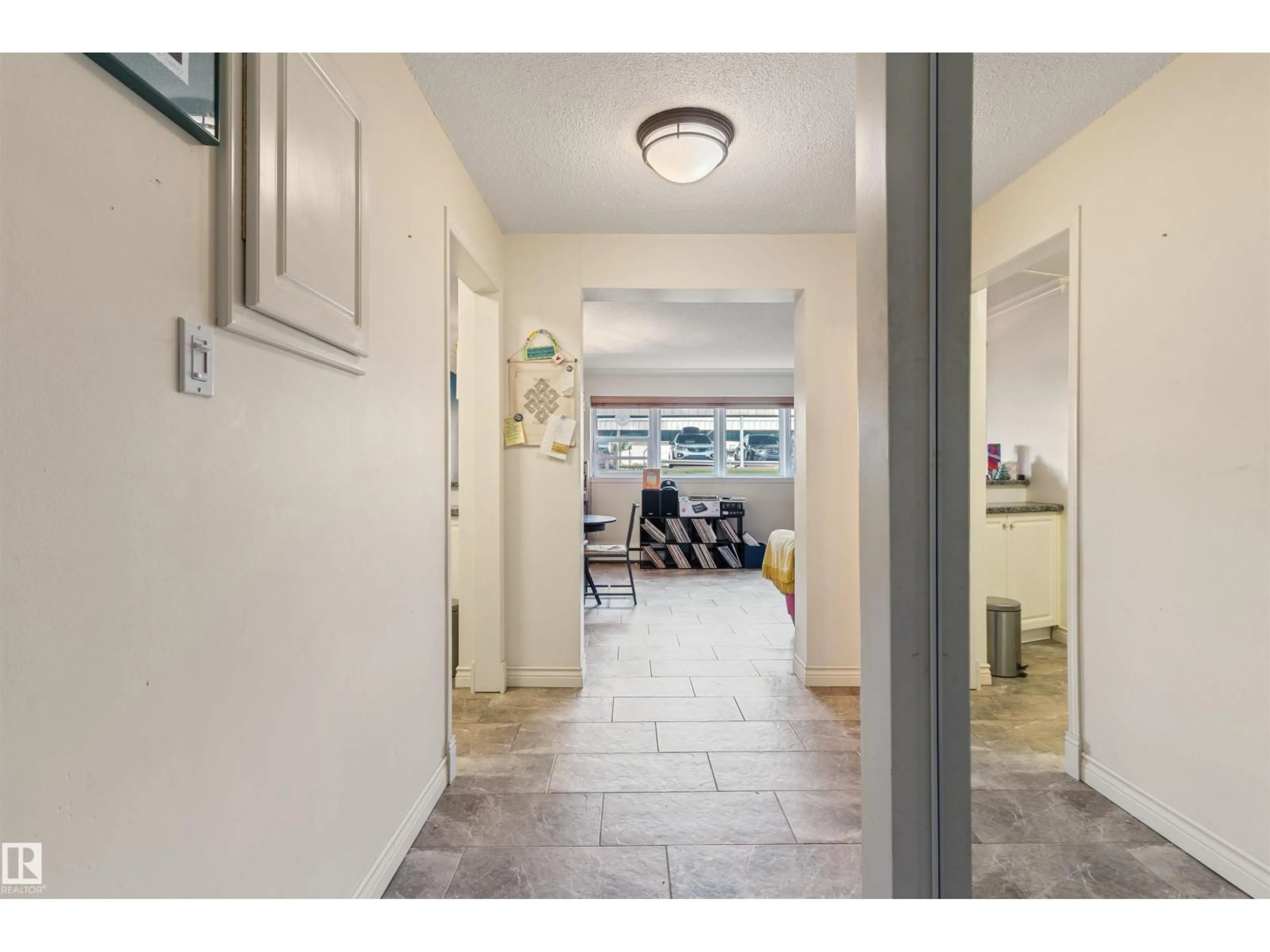 Indoor foyer for #104 - 7816 106 AV, Edmonton Alberta T6A1H5
