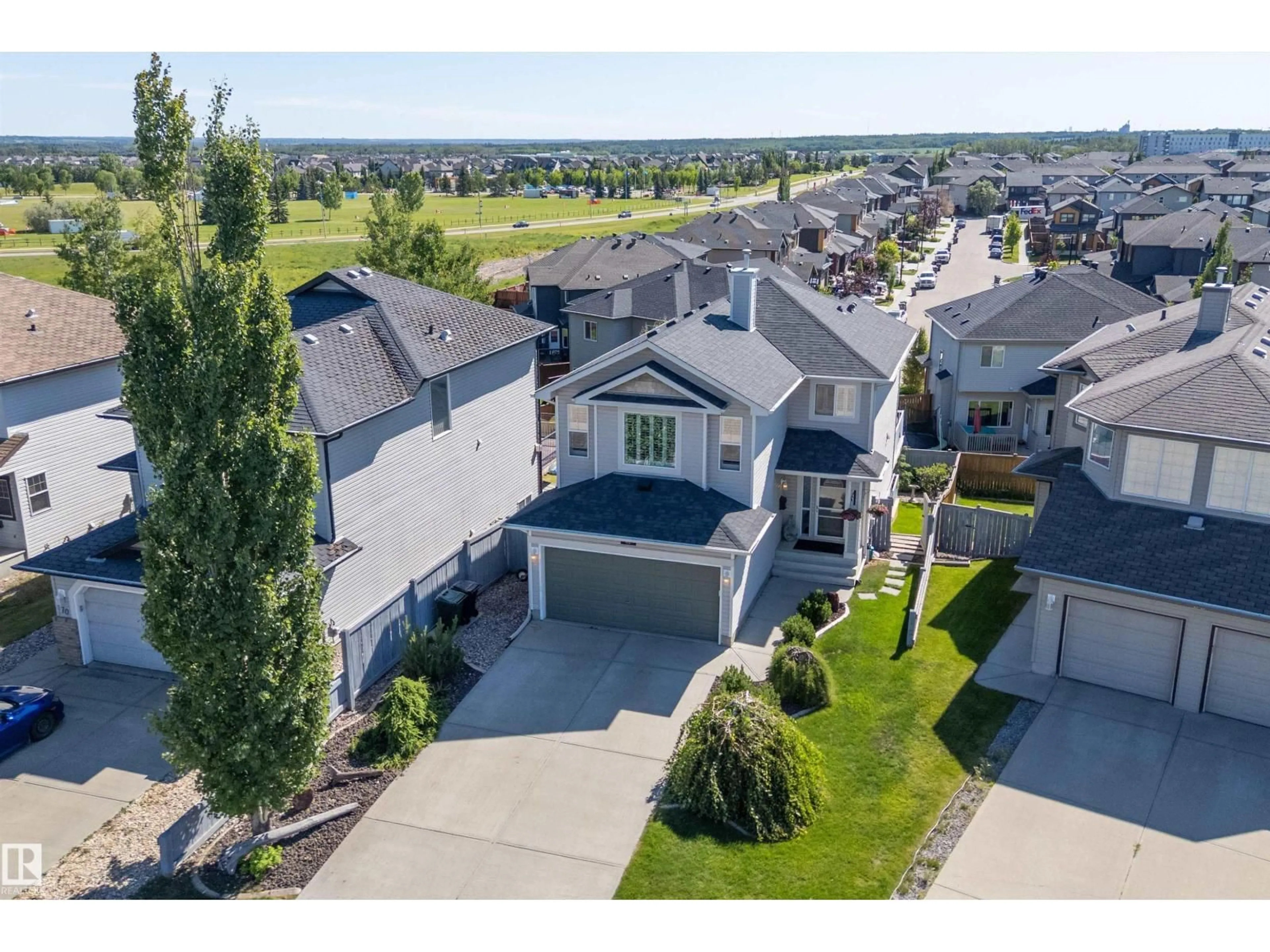 A pic from outside/outdoor area/front of a property/back of a property/a pic from drone, street for 68 GREYSTONE CR, Spruce Grove Alberta T7X0A7