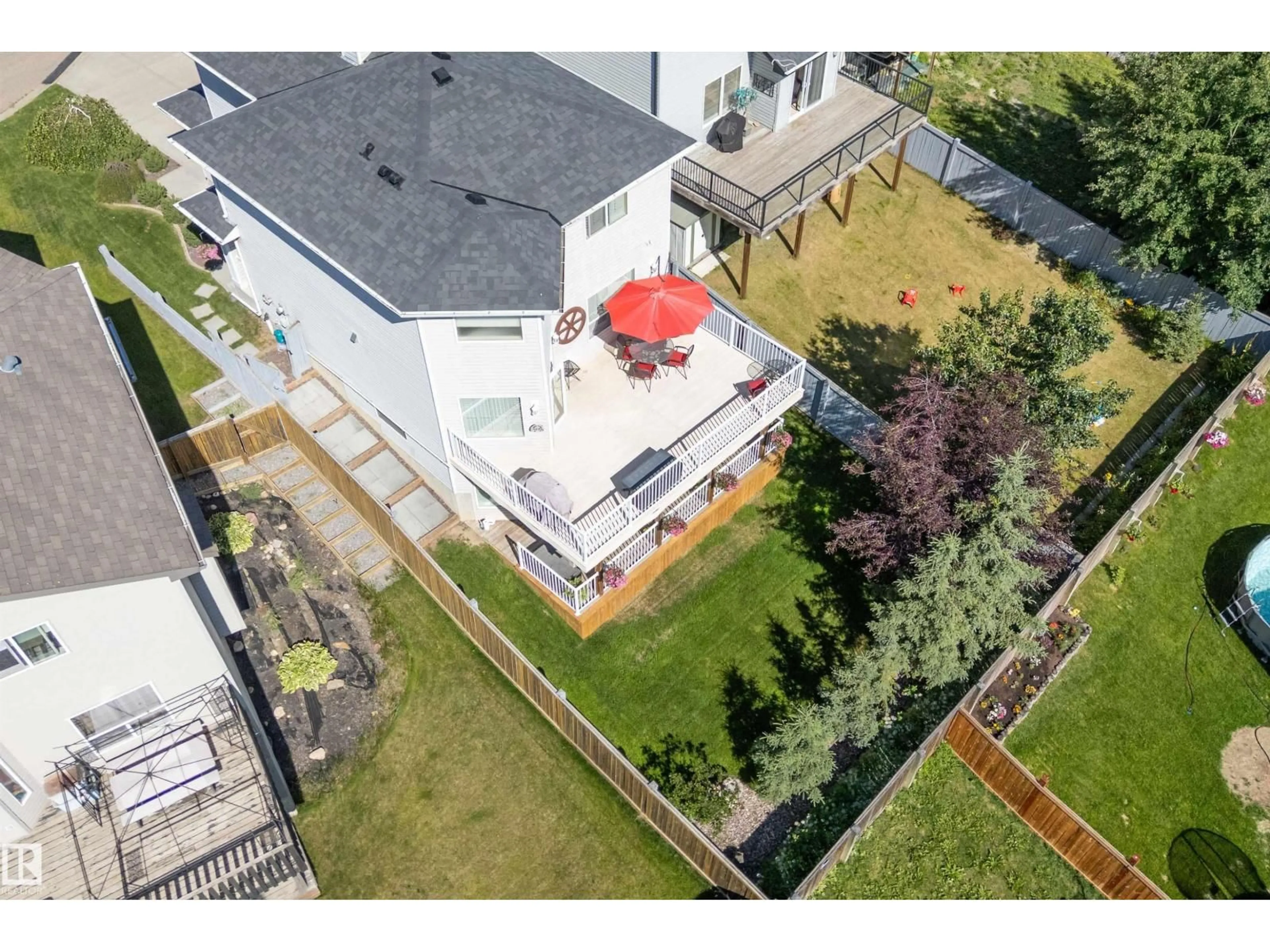A pic from outside/outdoor area/front of a property/back of a property/a pic from drone, unknown for 68 GREYSTONE CR, Spruce Grove Alberta T7X0A7