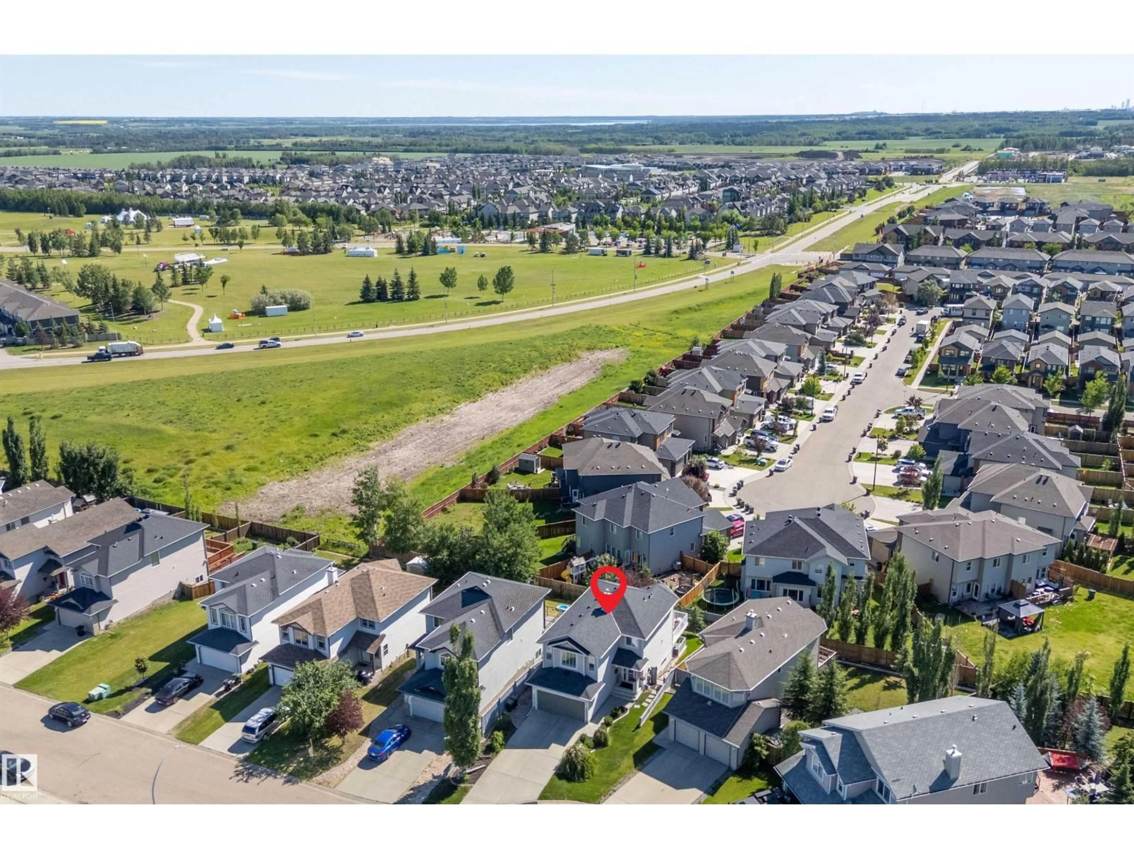 A pic from outside/outdoor area/front of a property/back of a property/a pic from drone, unknown for 68 GREYSTONE CR, Spruce Grove Alberta T7X0A7