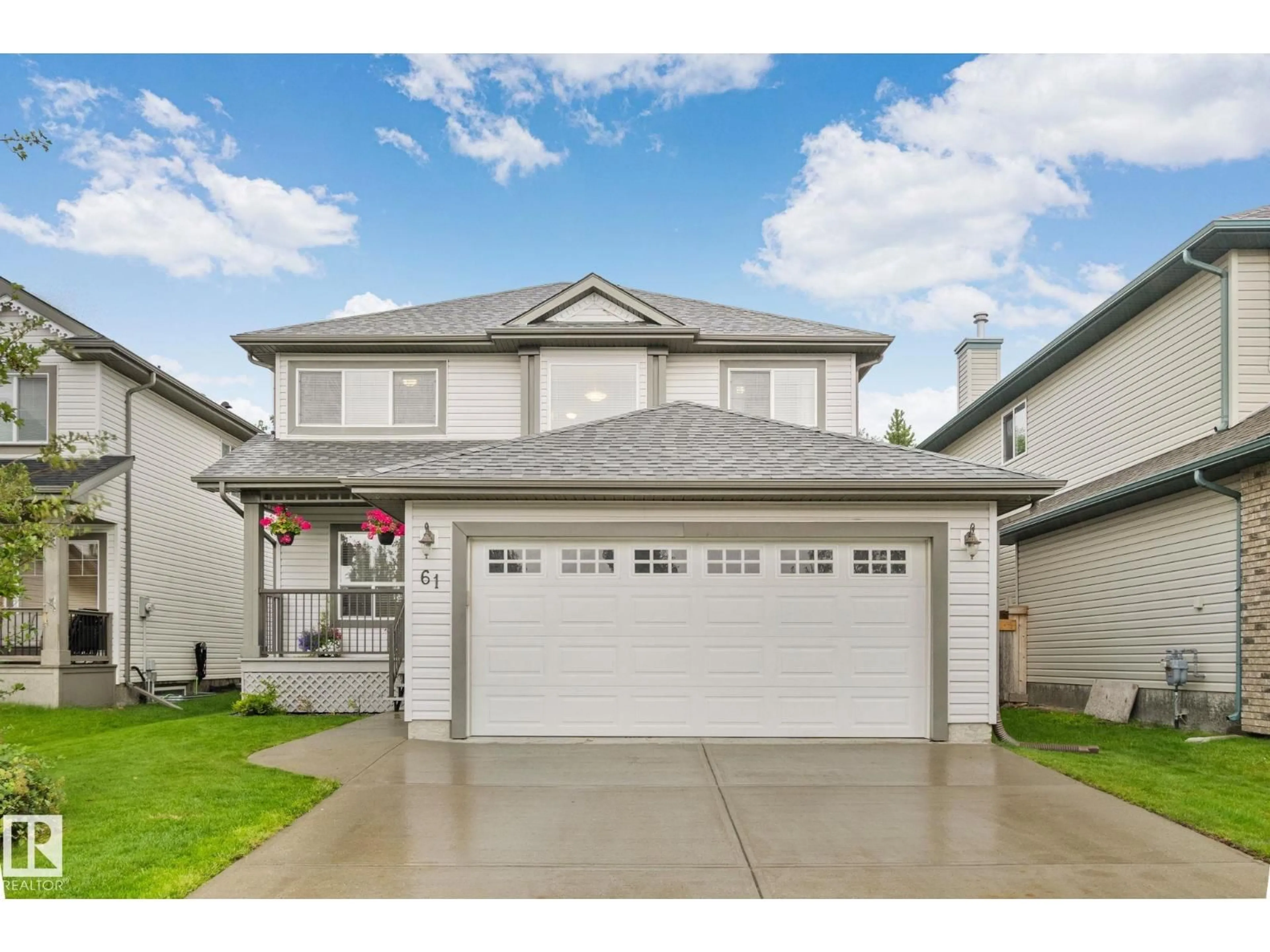 Home with vinyl exterior material, street for 61 RUE MONETTE, Beaumont Alberta T4X1T2