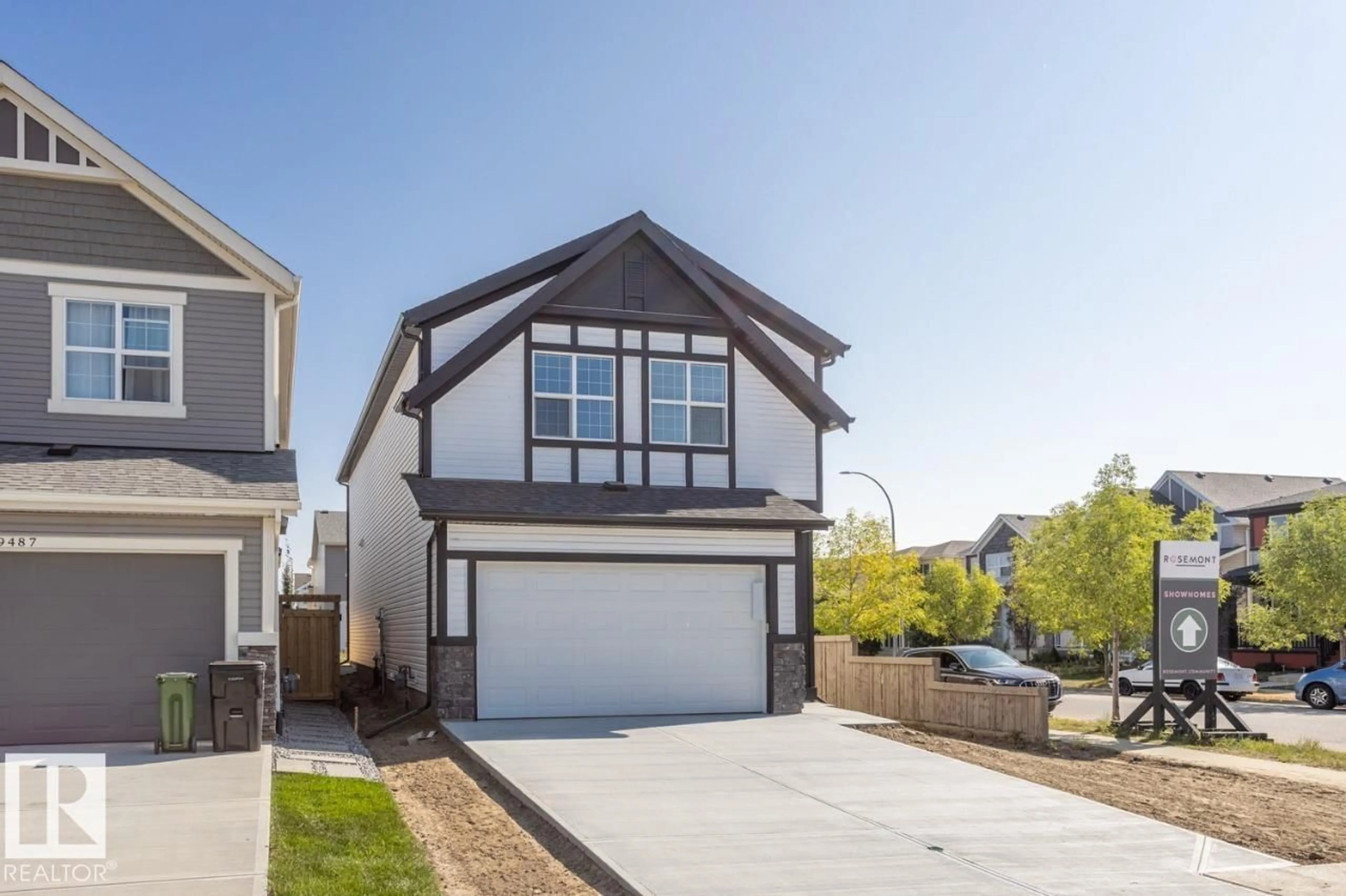 Home with vinyl exterior material, street for NW - 9483 228 ST, Edmonton Alberta T5T7H5
