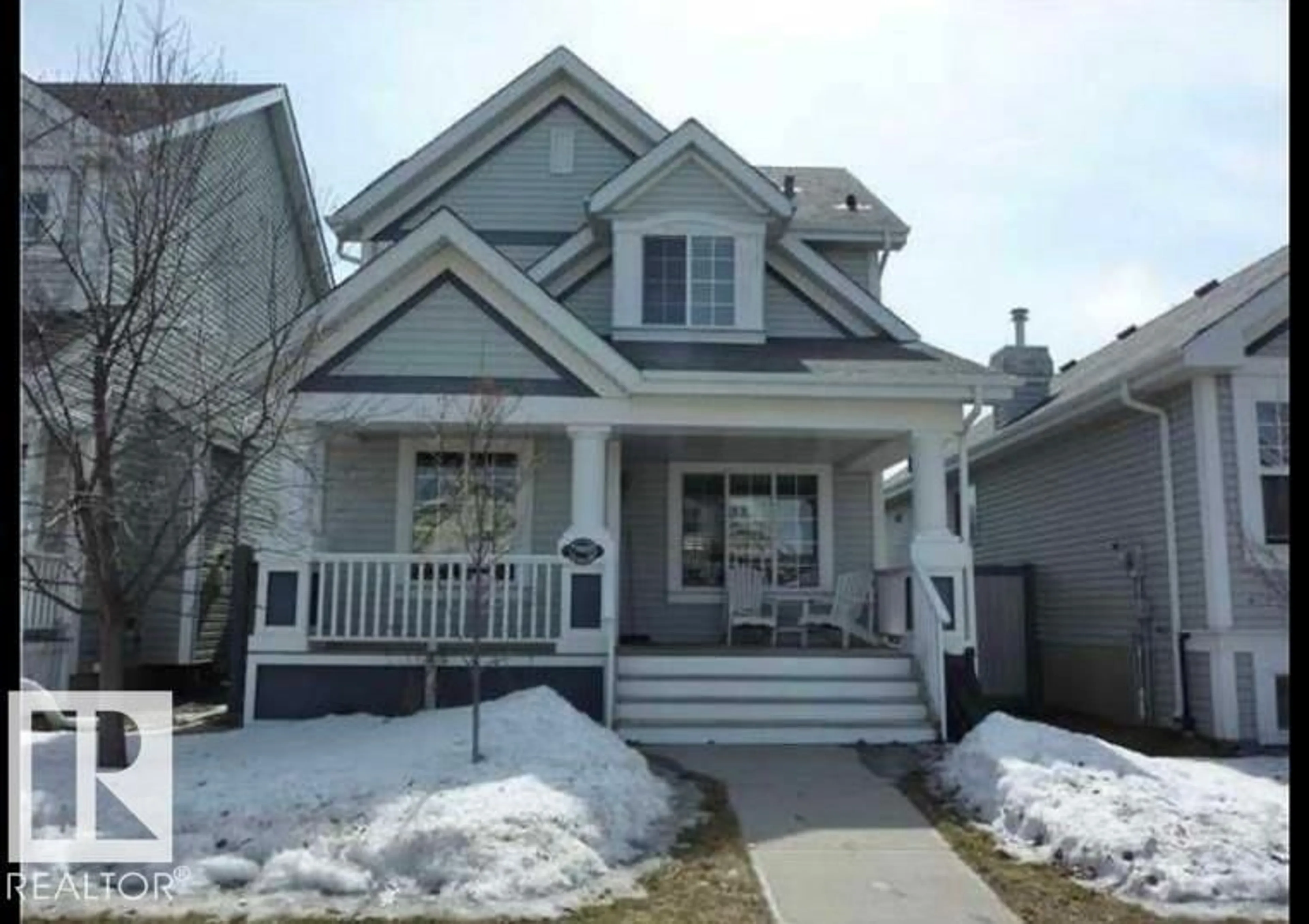 Home with vinyl exterior material, street for 7905 12 AV, Edmonton Alberta T6X1E8