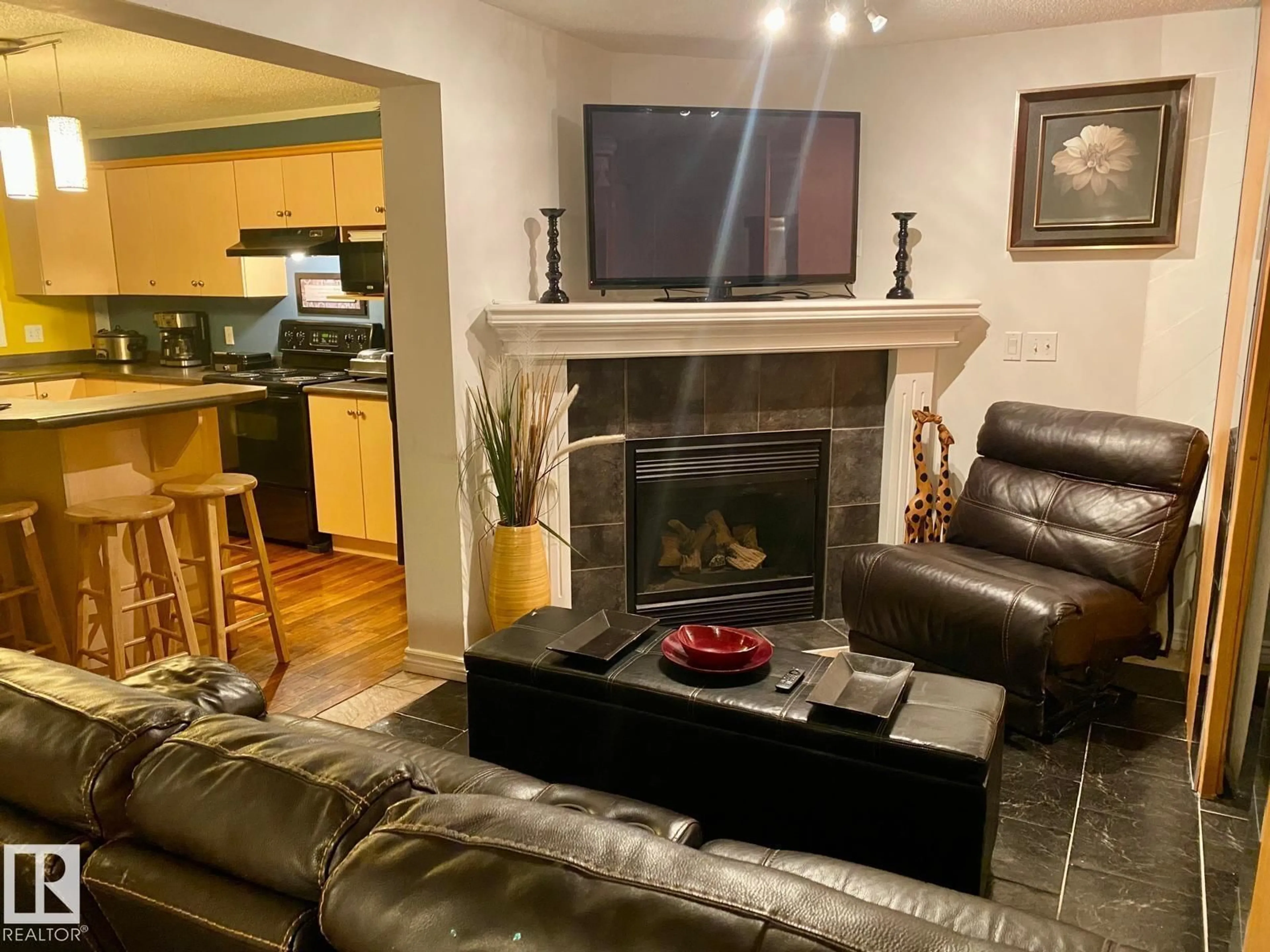 Living room with furniture, unknown for 7905 12 AV, Edmonton Alberta T6X1E8