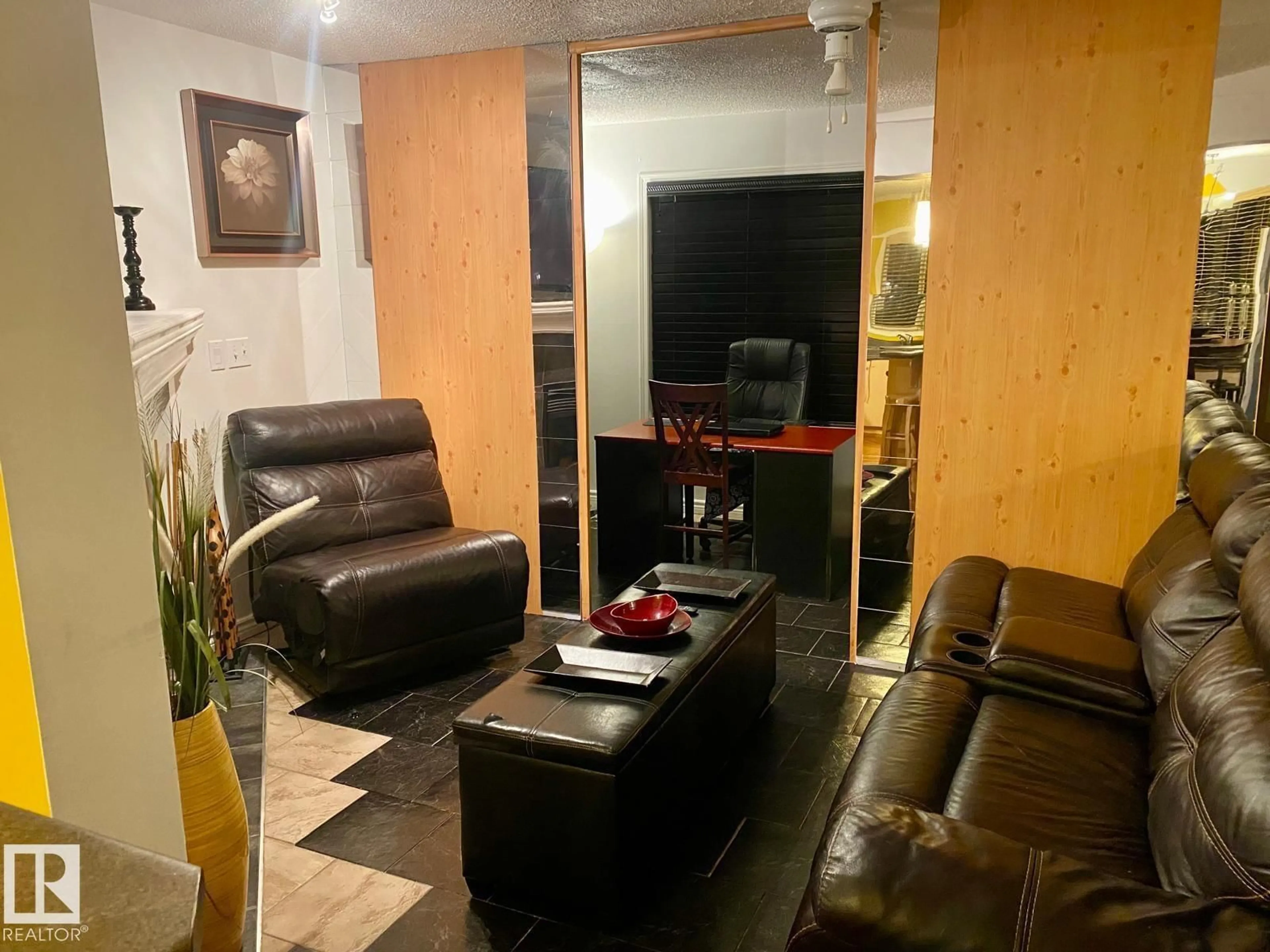 Living room with furniture, unknown for 7905 12 AV, Edmonton Alberta T6X1E8