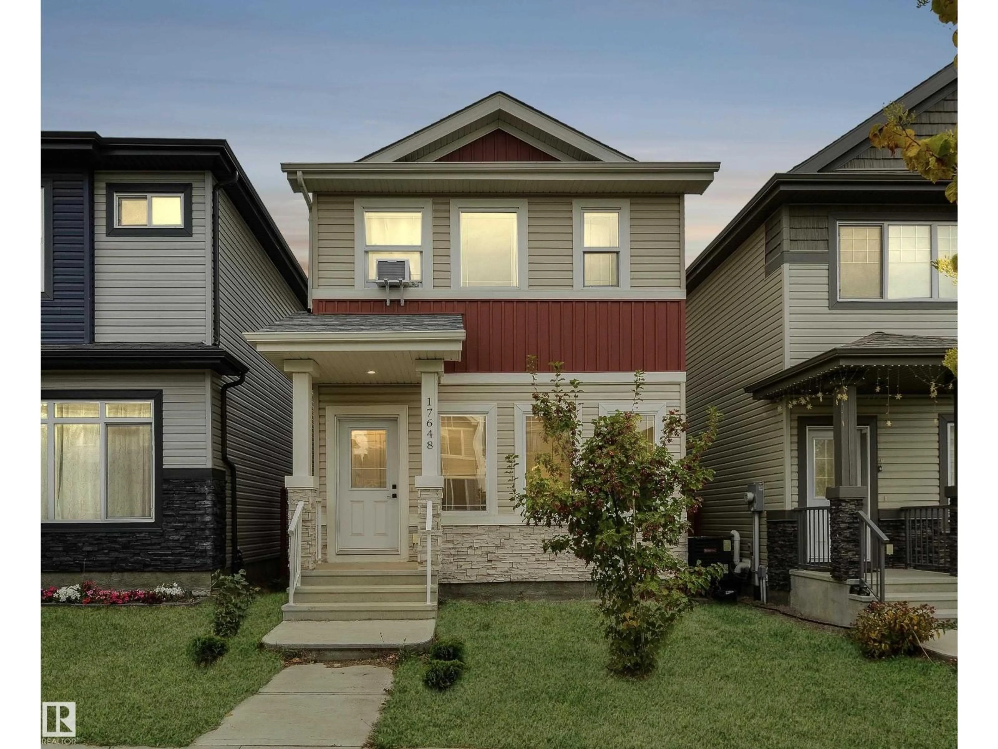 Home with vinyl exterior material, street for NW - 17648 62 ST, Edmonton Alberta T5Y4B8