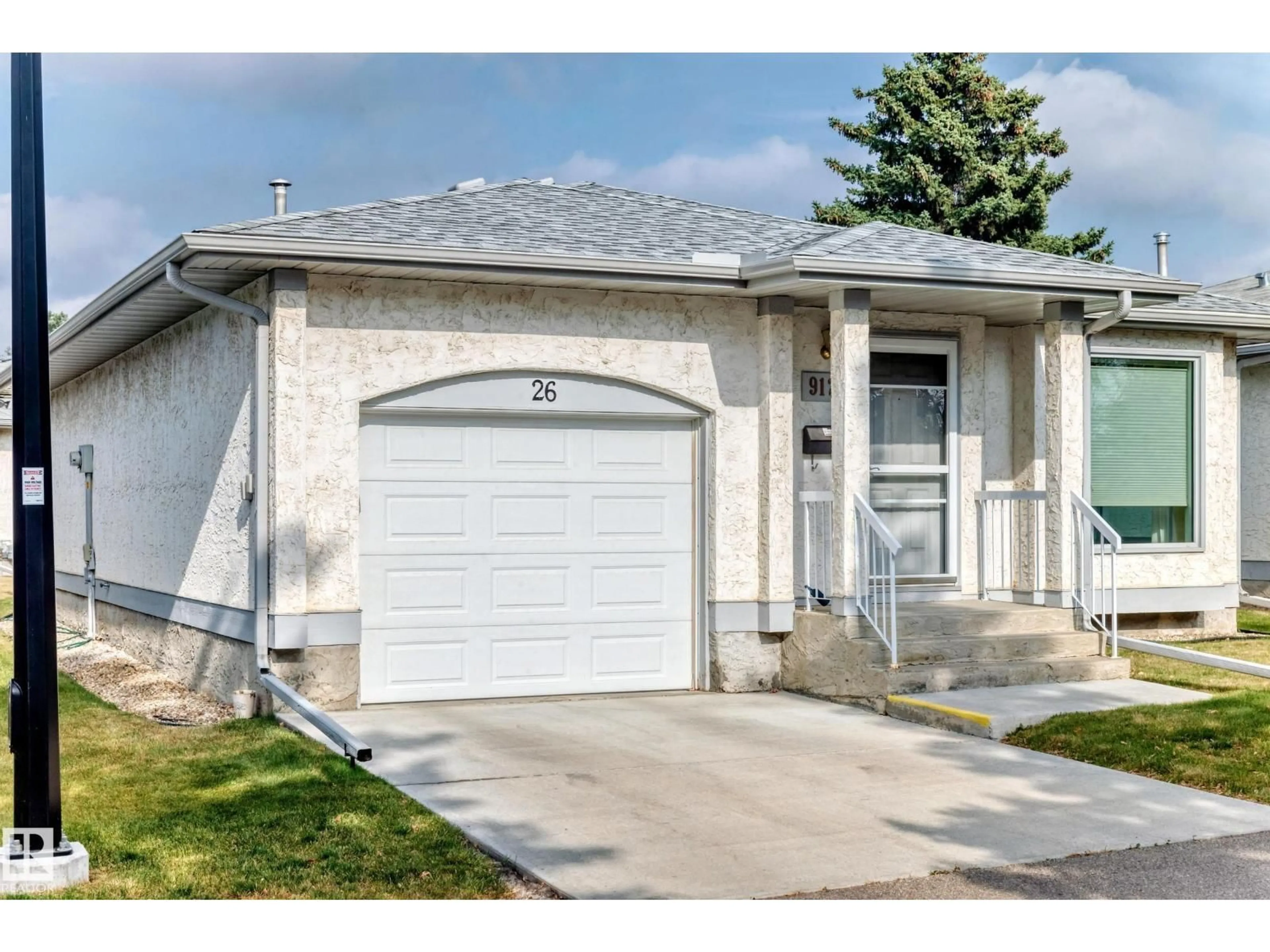 Home with vinyl exterior material, street for 9126 GARDEN RD, St. Albert Alberta T8N5N3