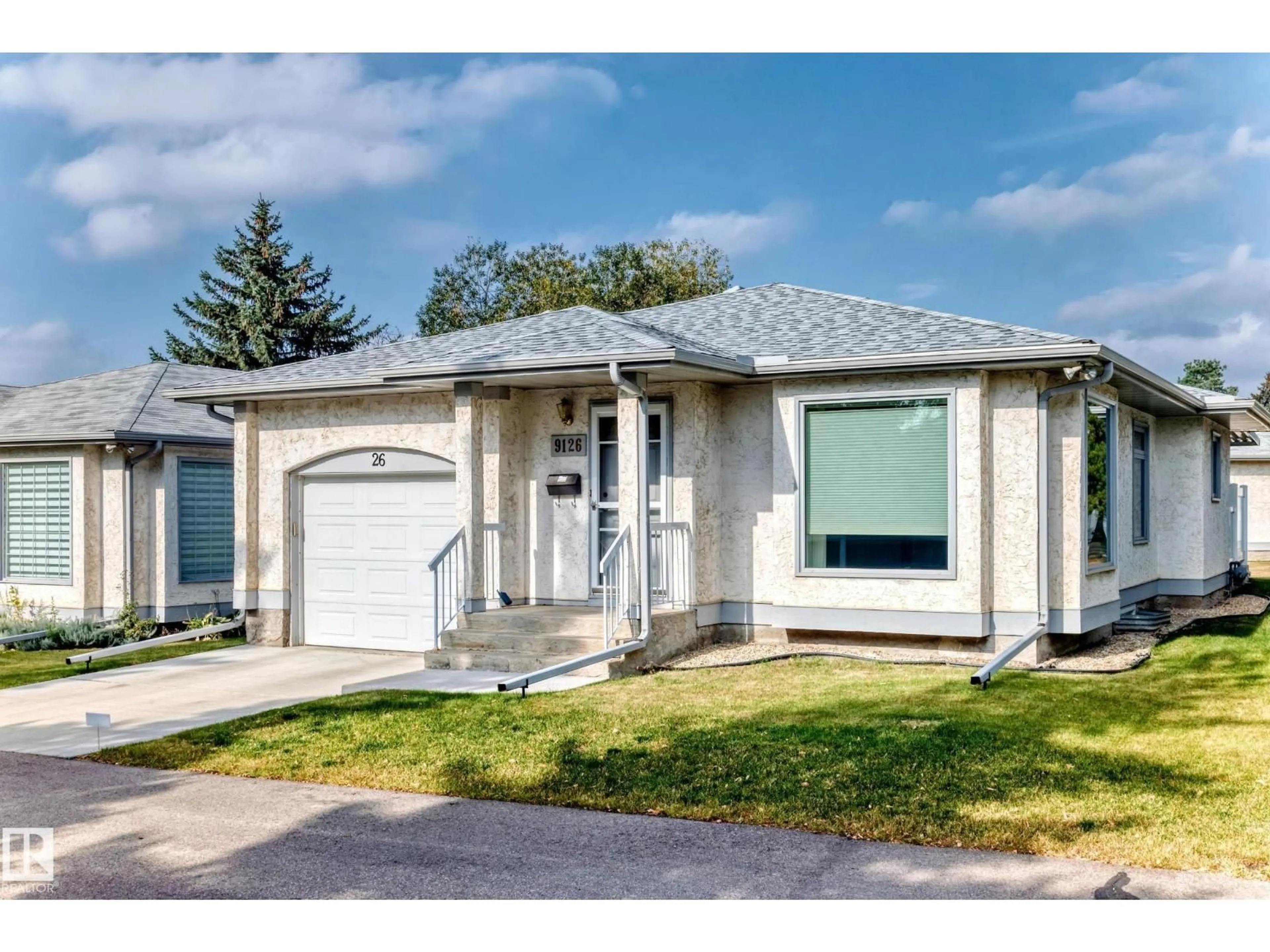 Home with vinyl exterior material, street for 9126 GARDEN RD, St. Albert Alberta T8N5N3