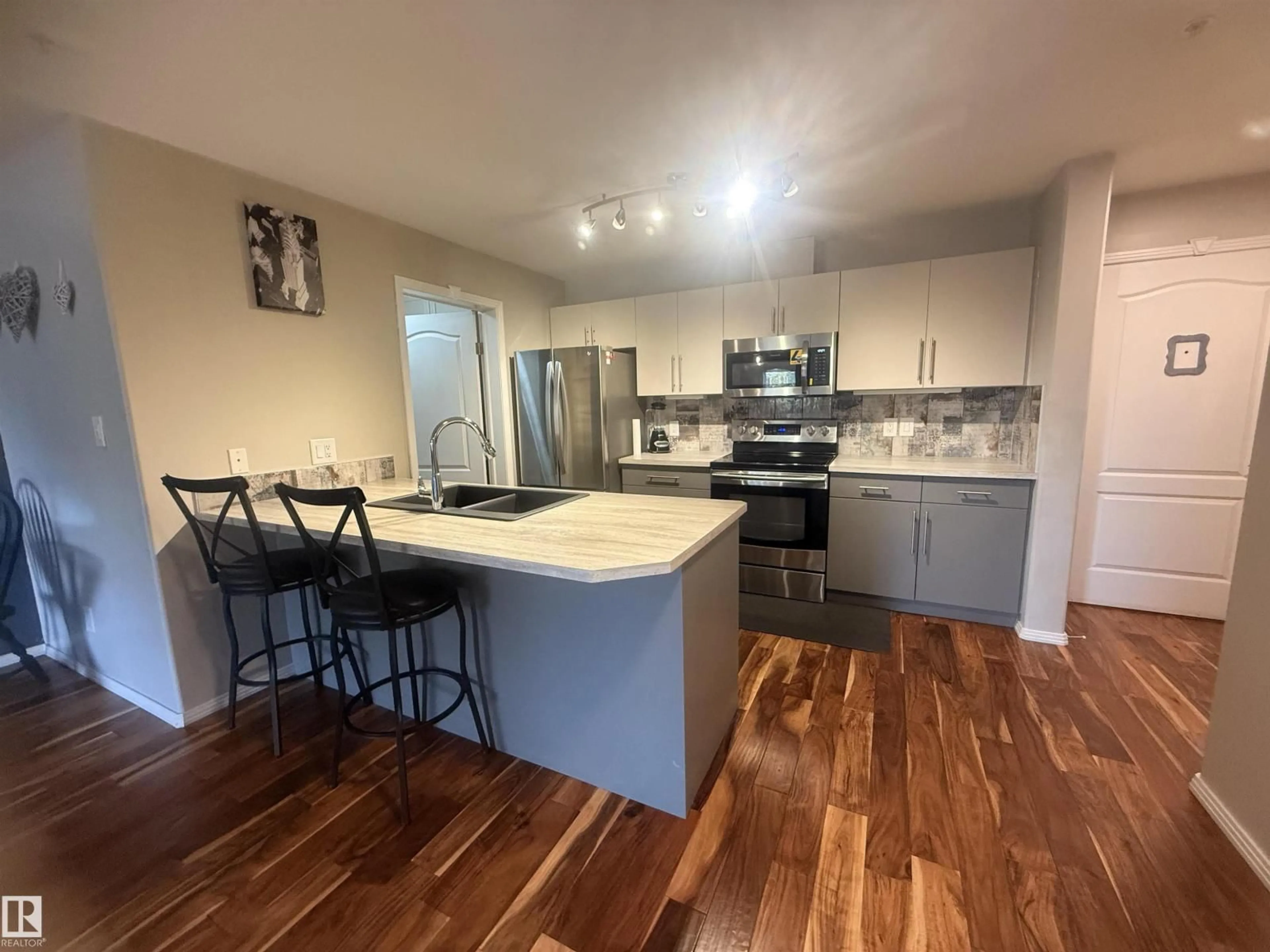 Open concept kitchen, unknown for 230 592 HOOKE RD NW, Edmonton Alberta T5A5H2