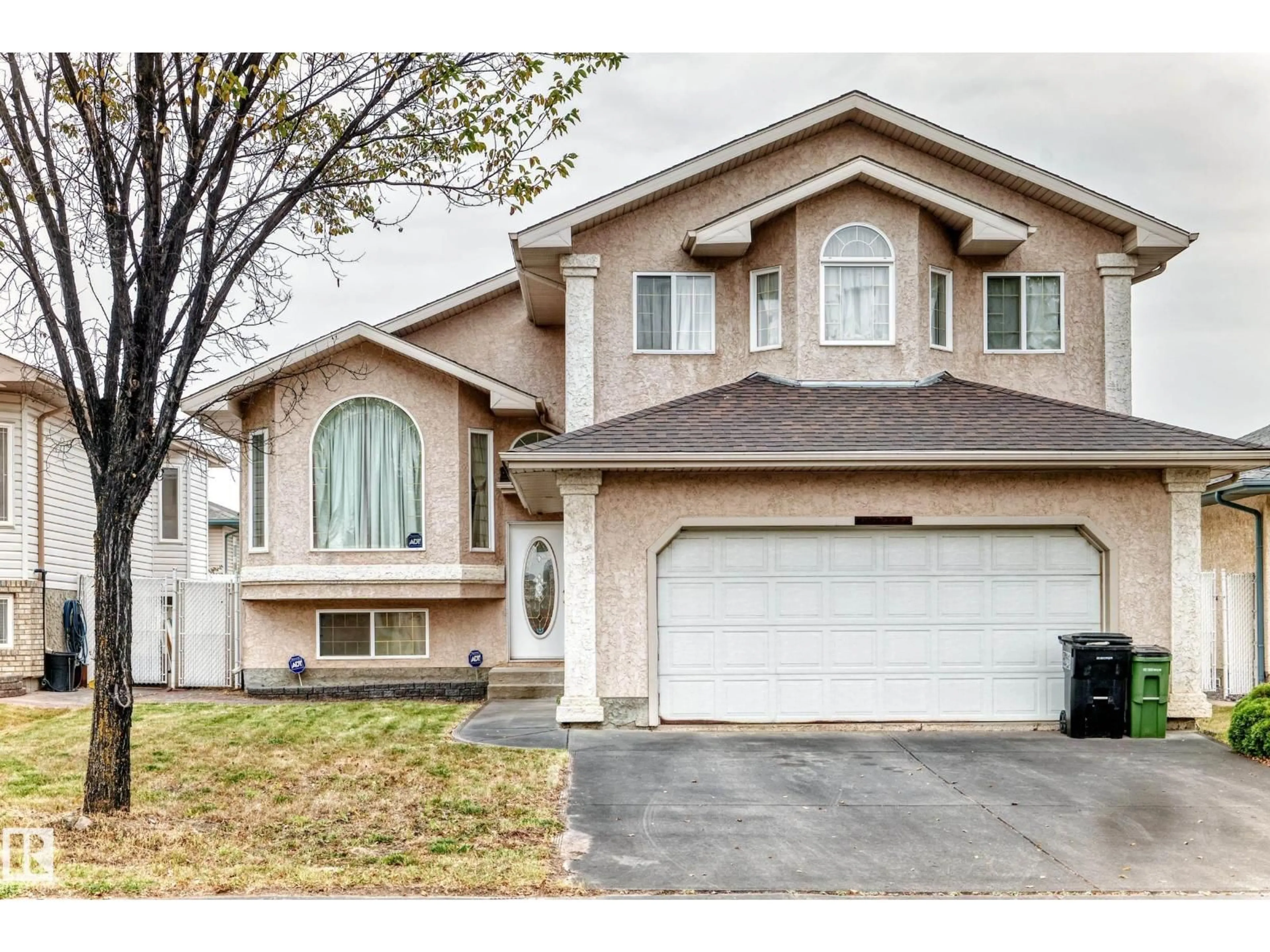 Home with vinyl exterior material, street for 16215 77 ST, Edmonton Alberta T5Z3N6