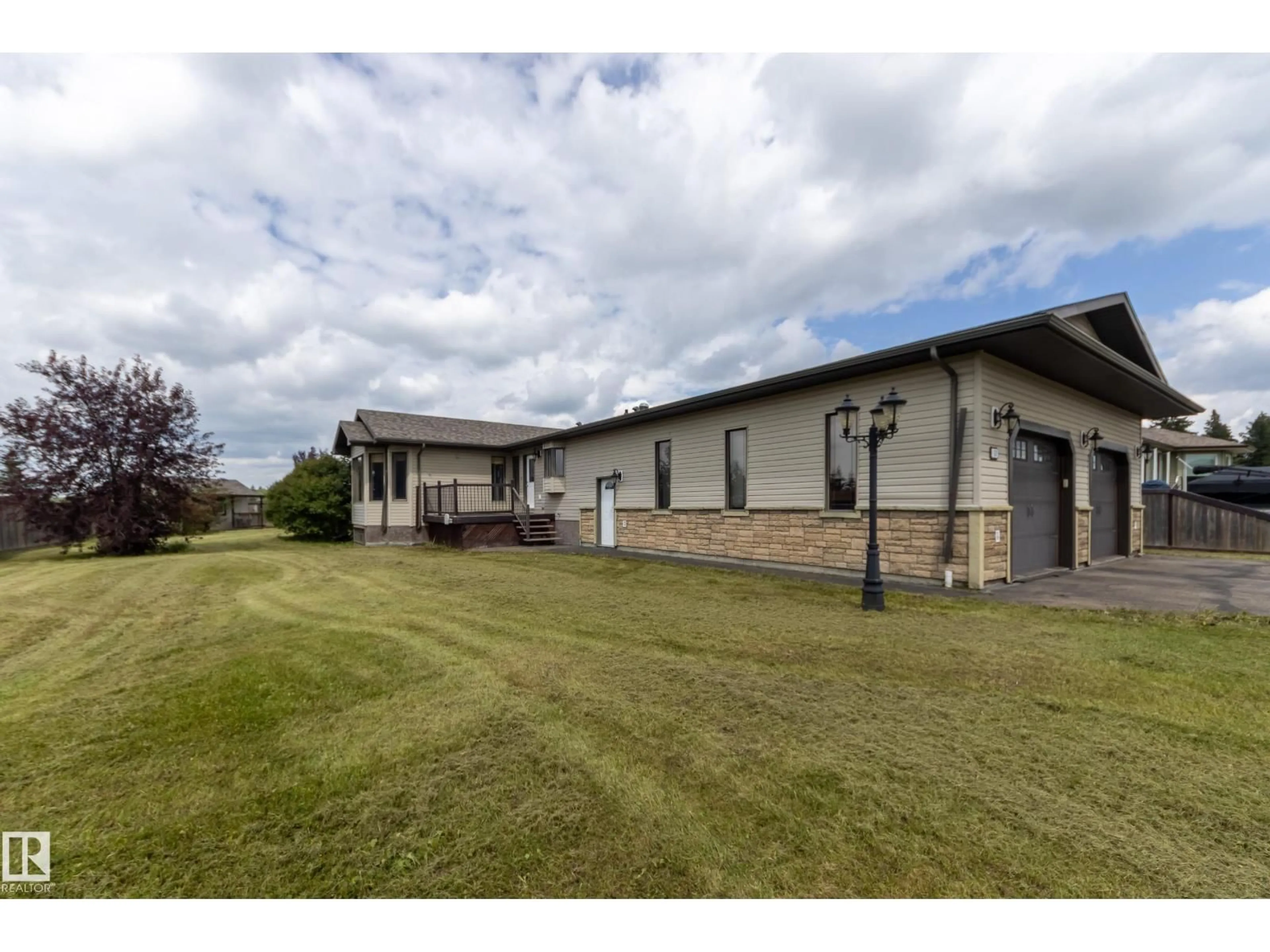 A pic from outside/outdoor area/front of a property/back of a property/a pic from drone, building for 12 FALCON DRIVE, New Sarepta Alberta T0B3M0