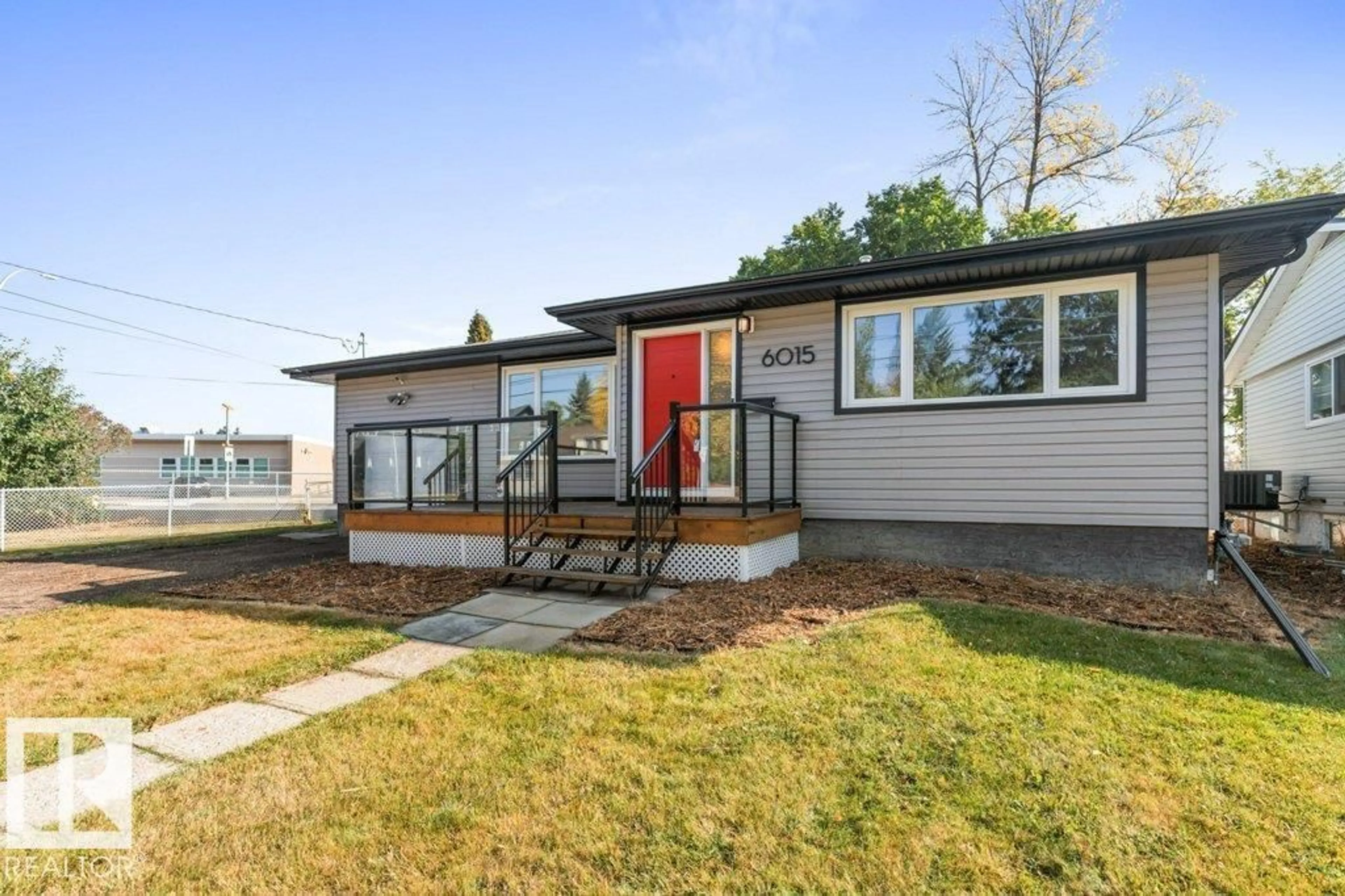 Home with vinyl exterior material, street for 6015 107 ST, Edmonton Alberta T6H2X9