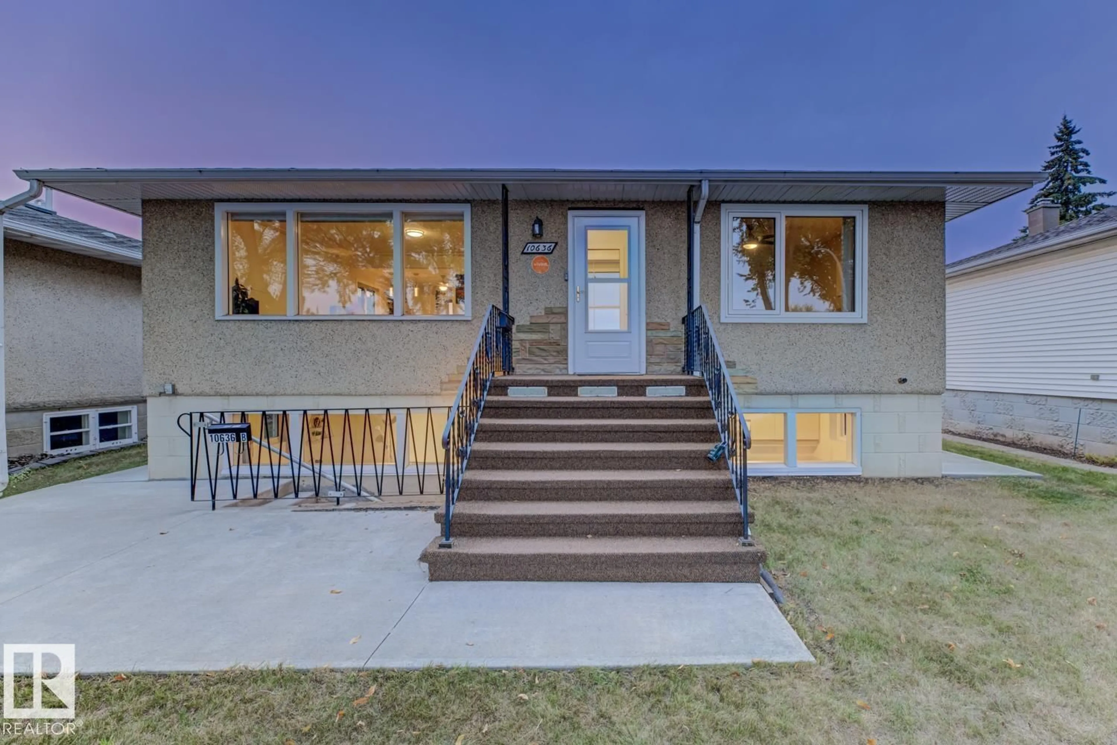 Home with vinyl exterior material, street for NW NW - 10636 79 ST, Edmonton Alberta T6A3H4