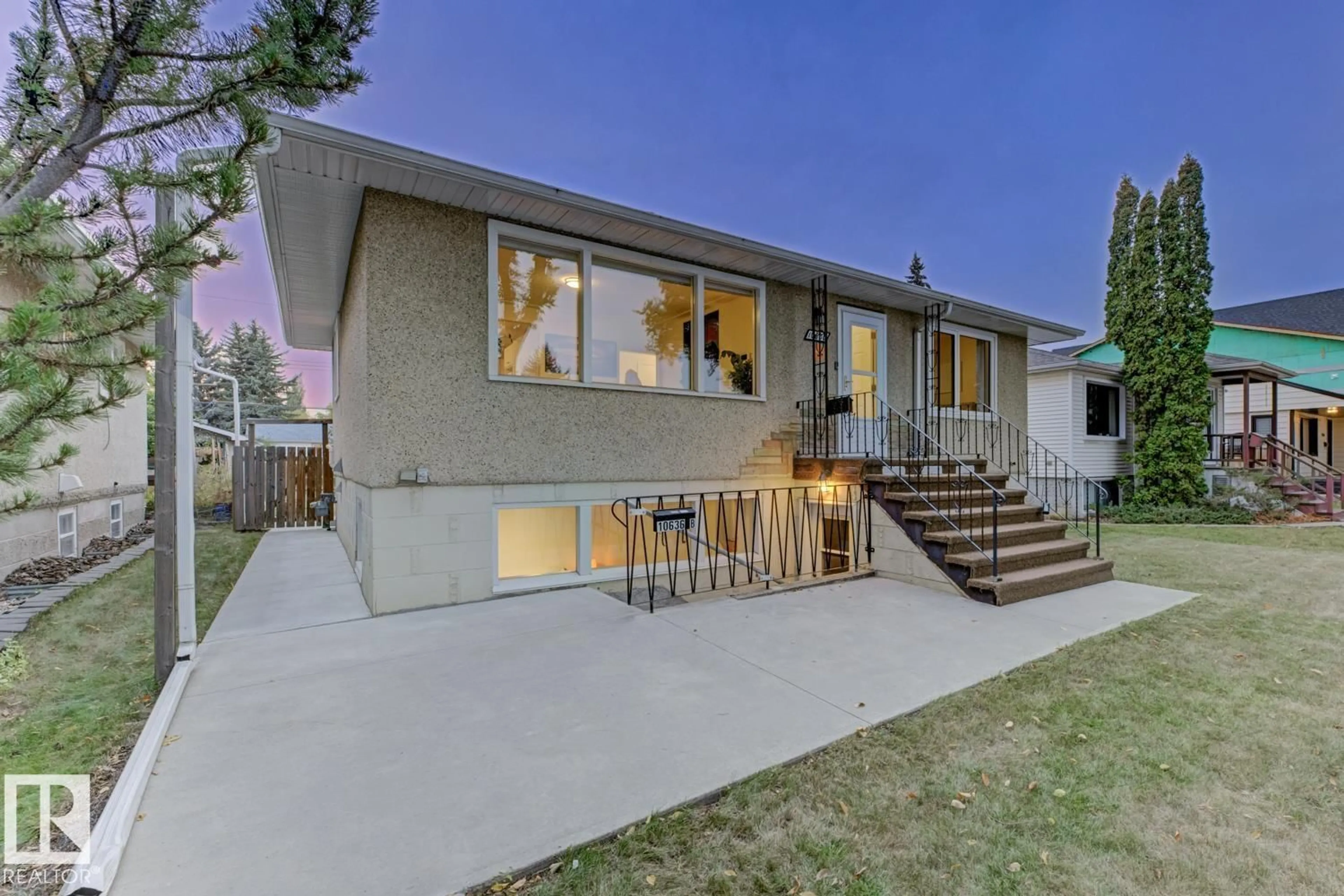 Home with vinyl exterior material, street for NW NW - 10636 79 ST, Edmonton Alberta T6A3H4