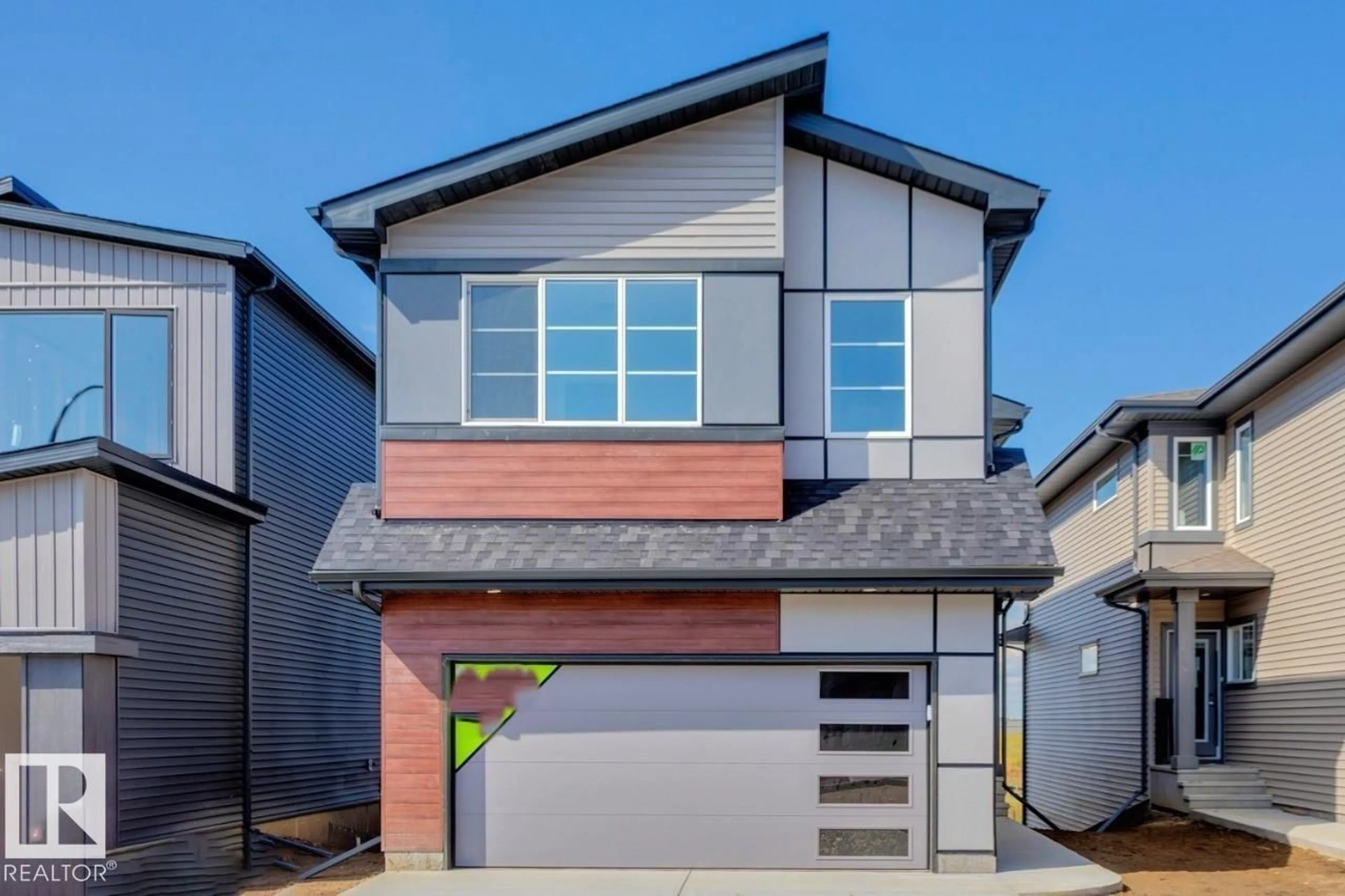 Home with vinyl exterior material, street for 36 GAMBEL LO, Spruce Grove Alberta T7X0C9