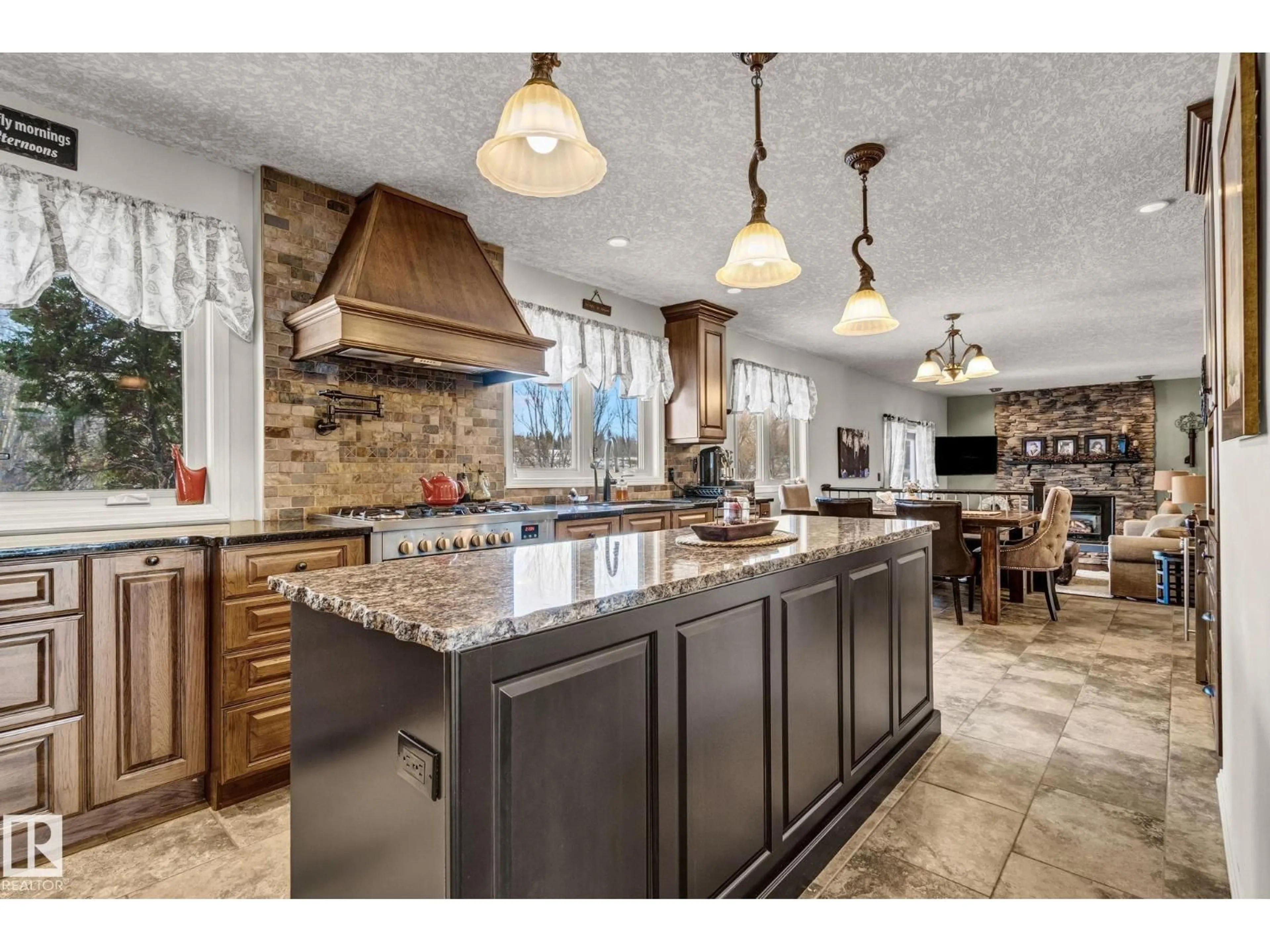 Open concept kitchen, ceramic/tile floor for 14 - 54006 RGE RD 274, Rural Parkland County Alberta T7X3S8