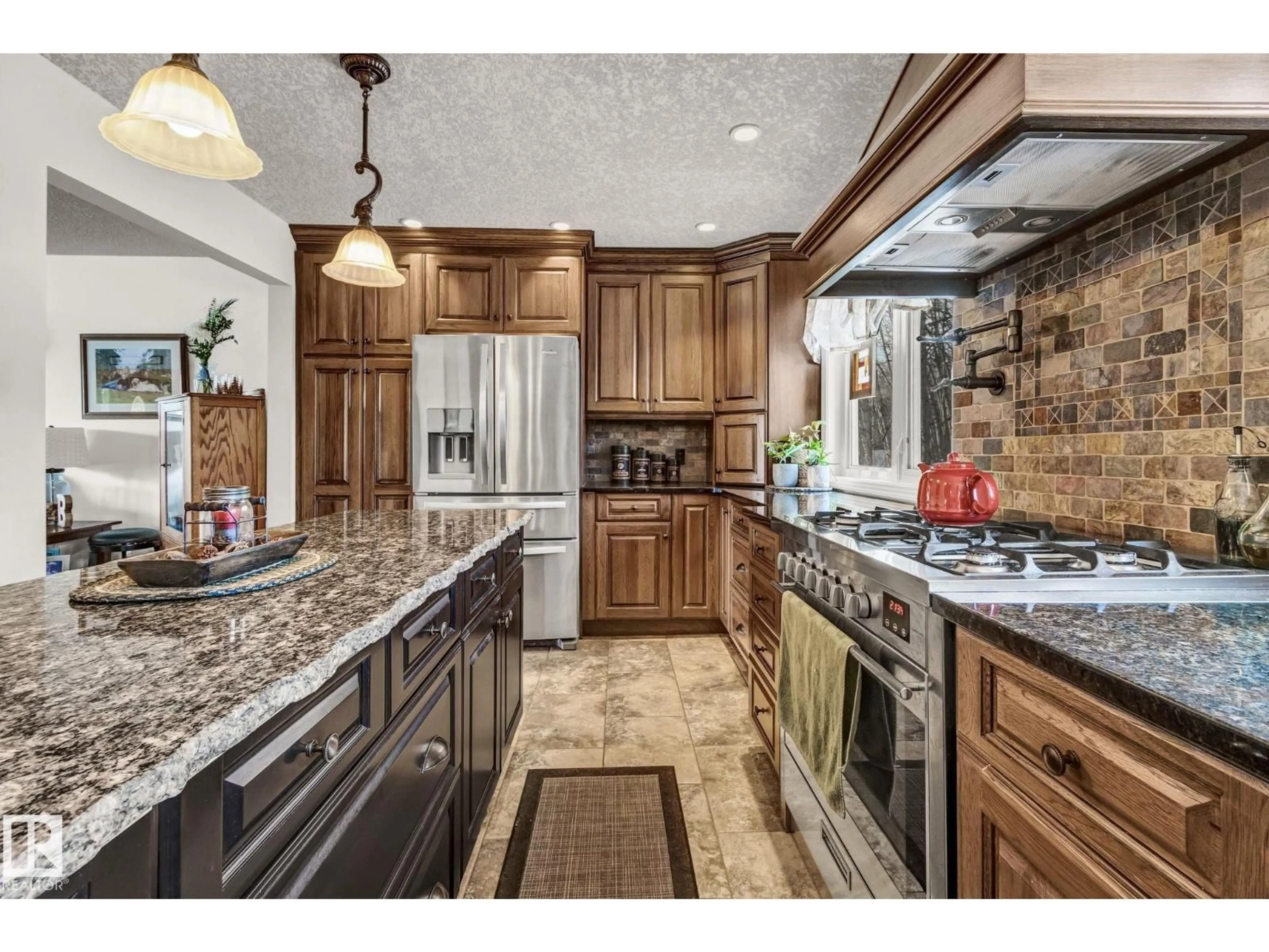 Open concept kitchen, ceramic/tile floor for 14 - 54006 RGE RD 274, Rural Parkland County Alberta T7X3S8