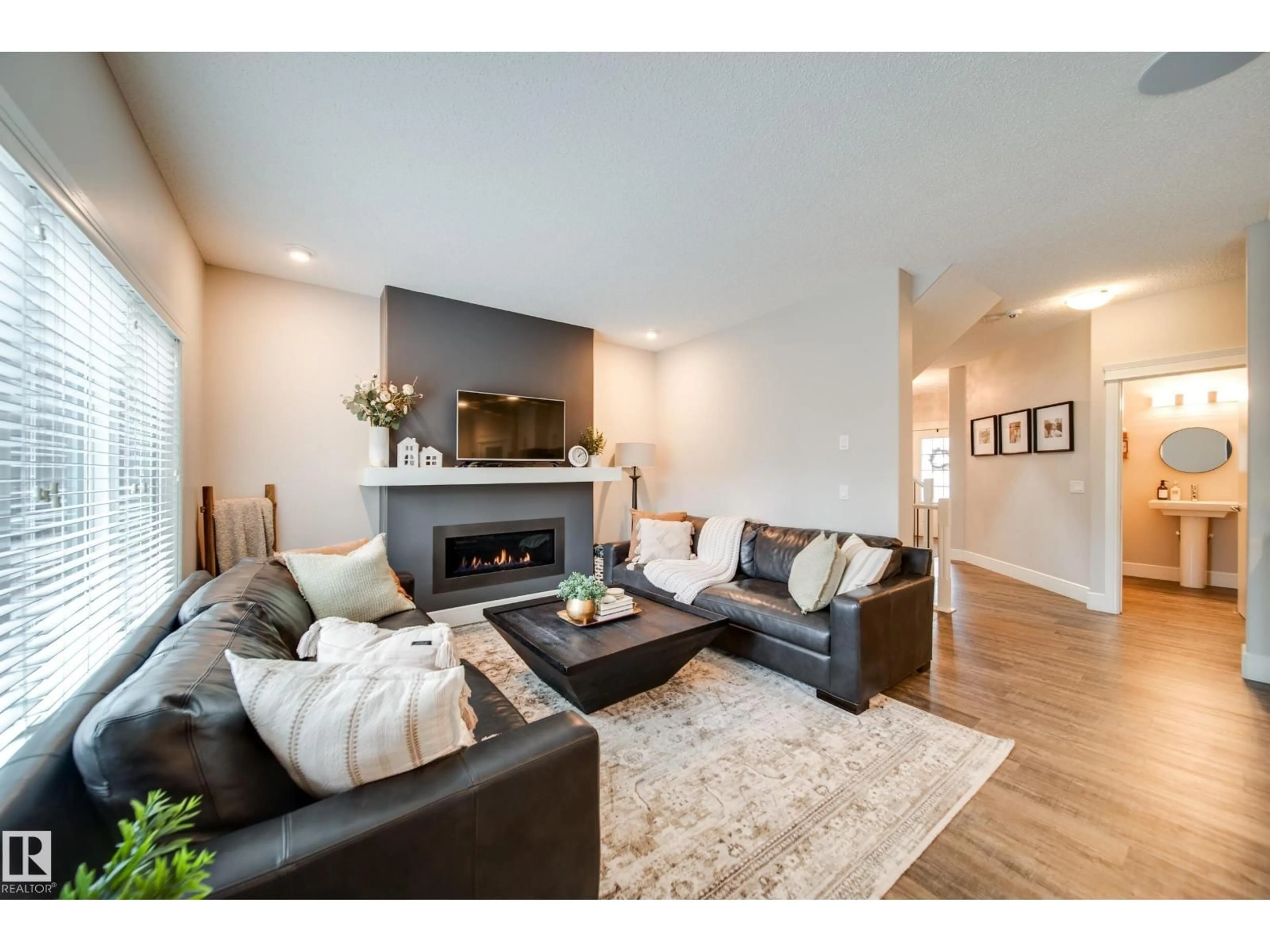 Living room with furniture, wood/laminate floor for 4373 CRABAPPLE CR, Edmonton Alberta T6X0X9