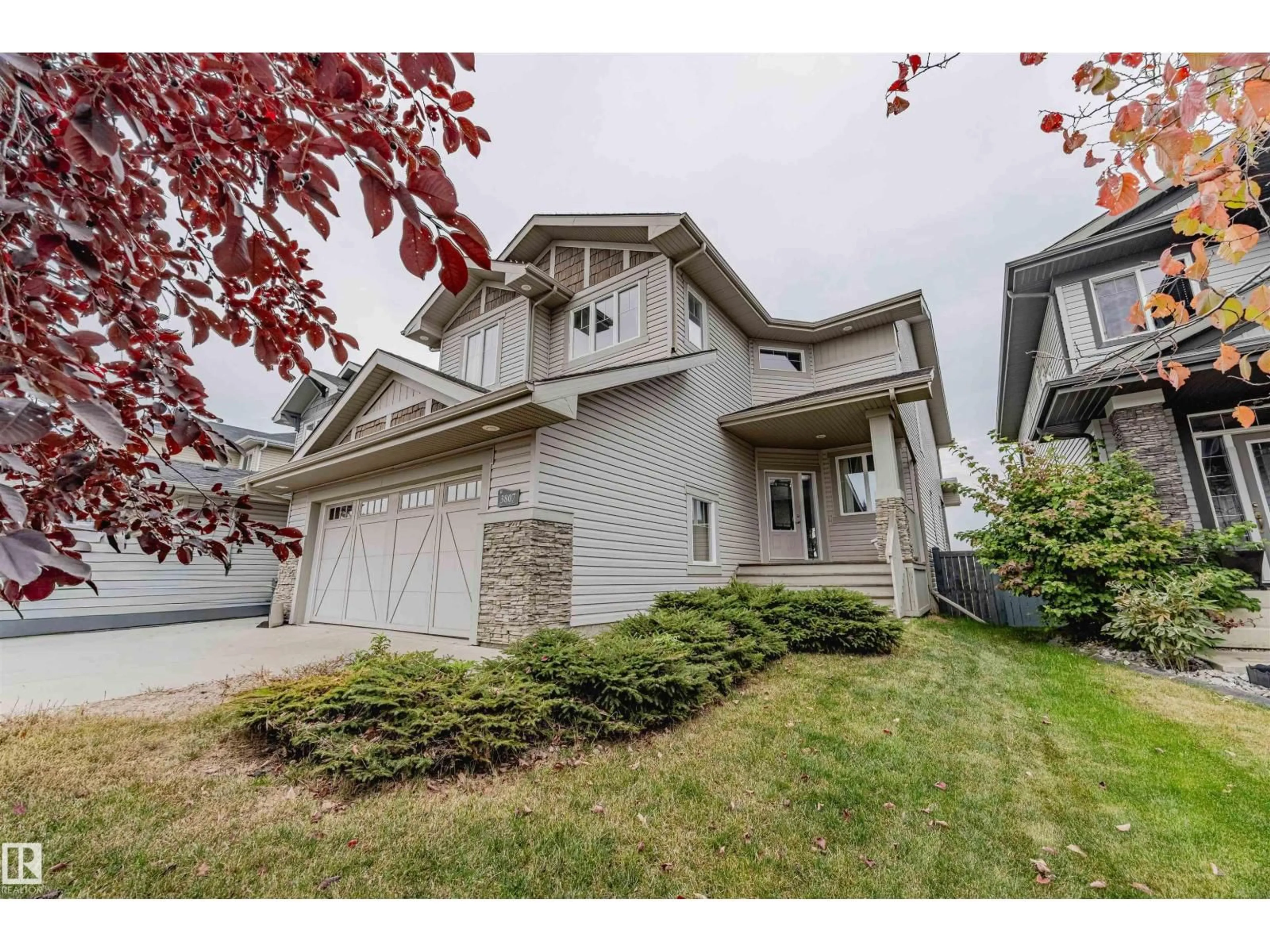 Home with vinyl exterior material, street for NW - 3807 GALLINGER LO, Edmonton Alberta T5T4G5