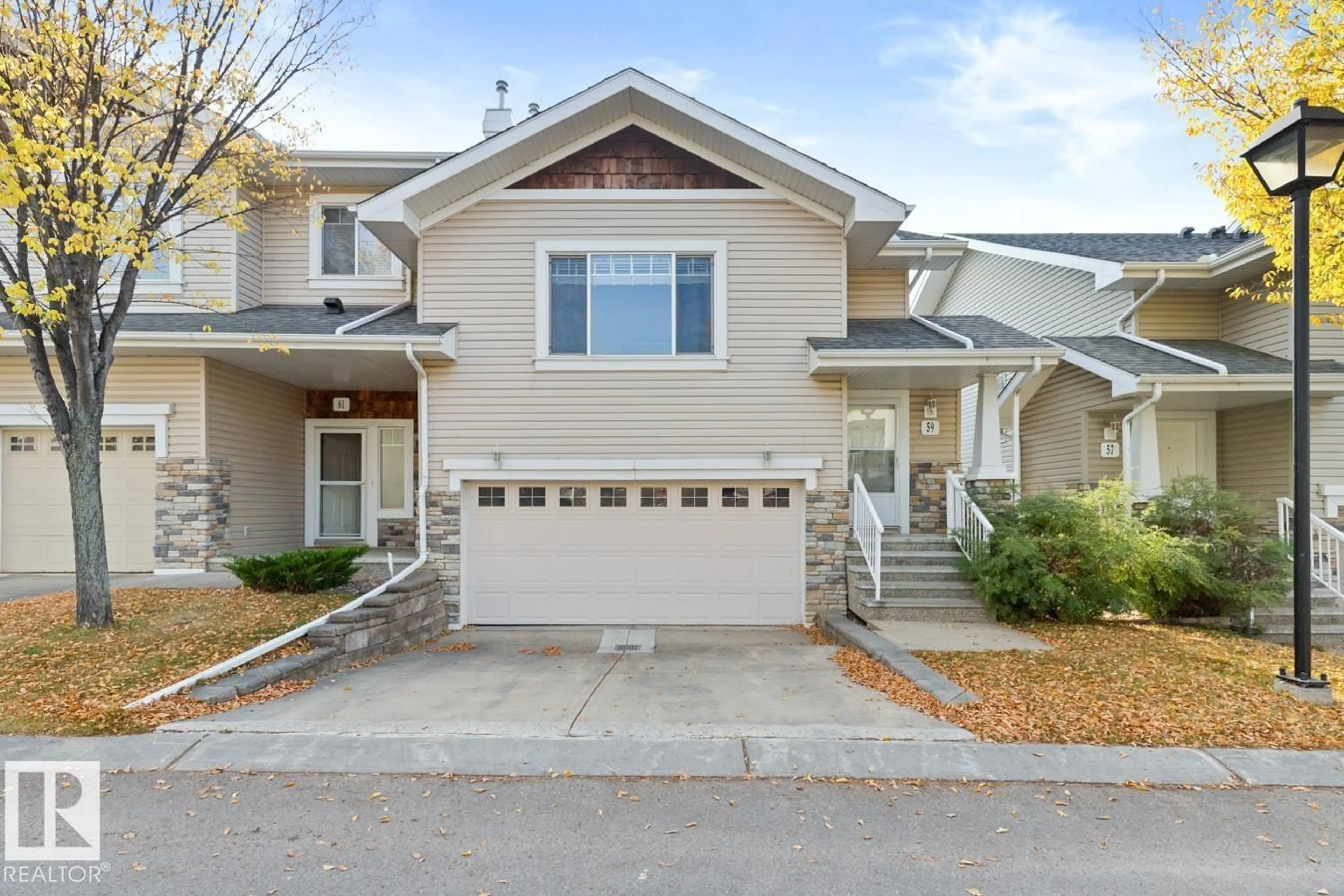 Home with vinyl exterior material, street for 59 - 2508 HANNA CR, Edmonton Alberta T6R3N7