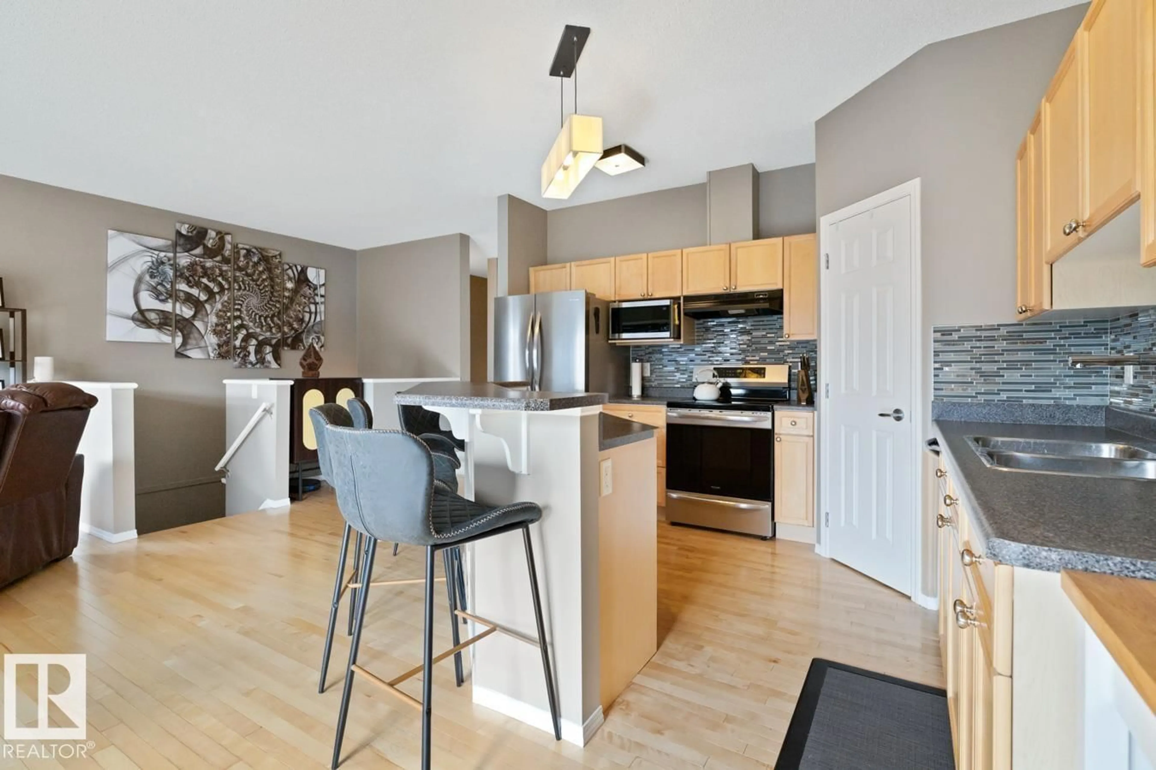 Contemporary kitchen, wood/laminate floor for 59 - 2508 HANNA CR, Edmonton Alberta T6R3N7