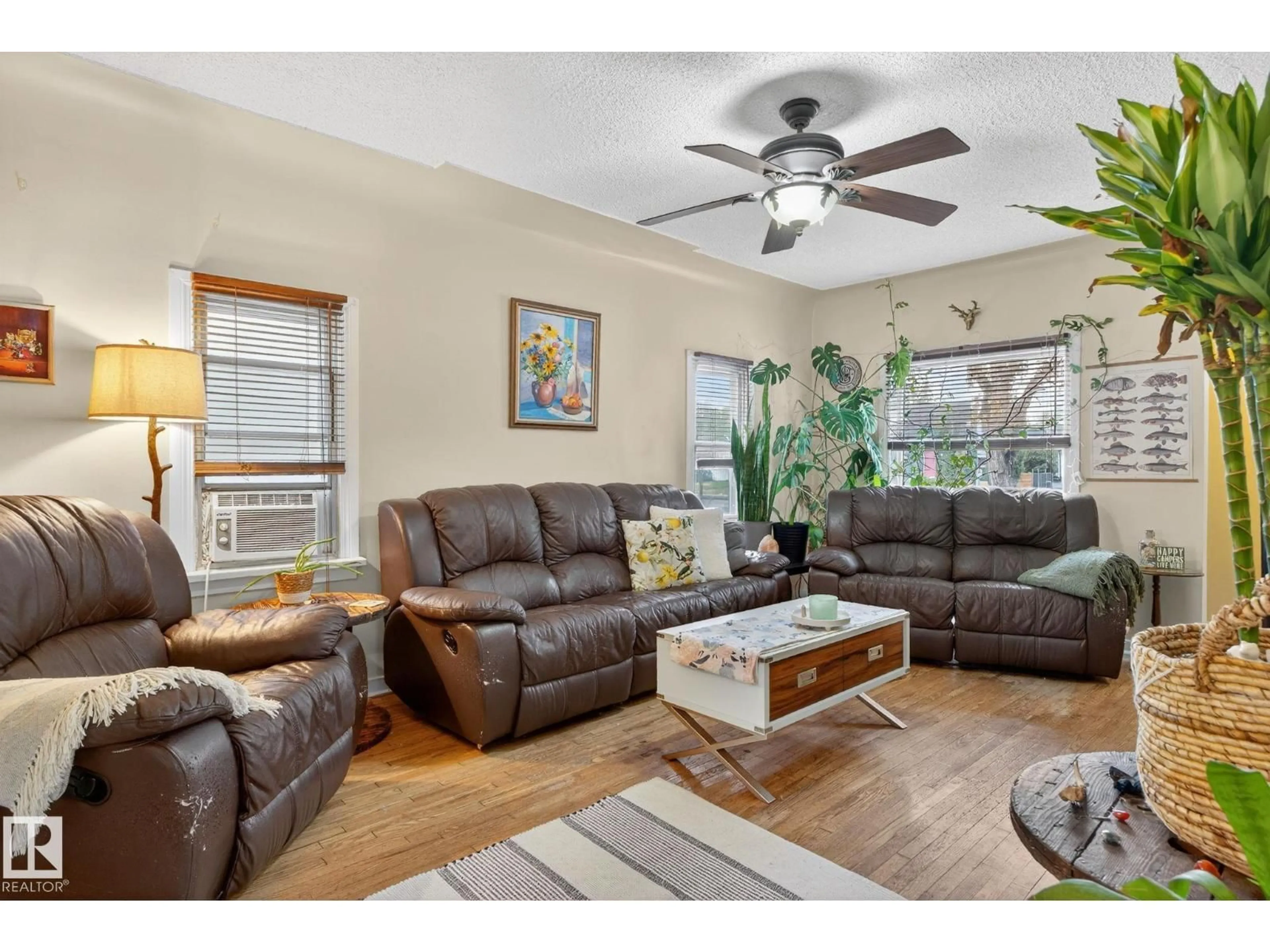 Living room with furniture, wood/laminate floor for 11621 101 ST, Edmonton Alberta T5G2B3