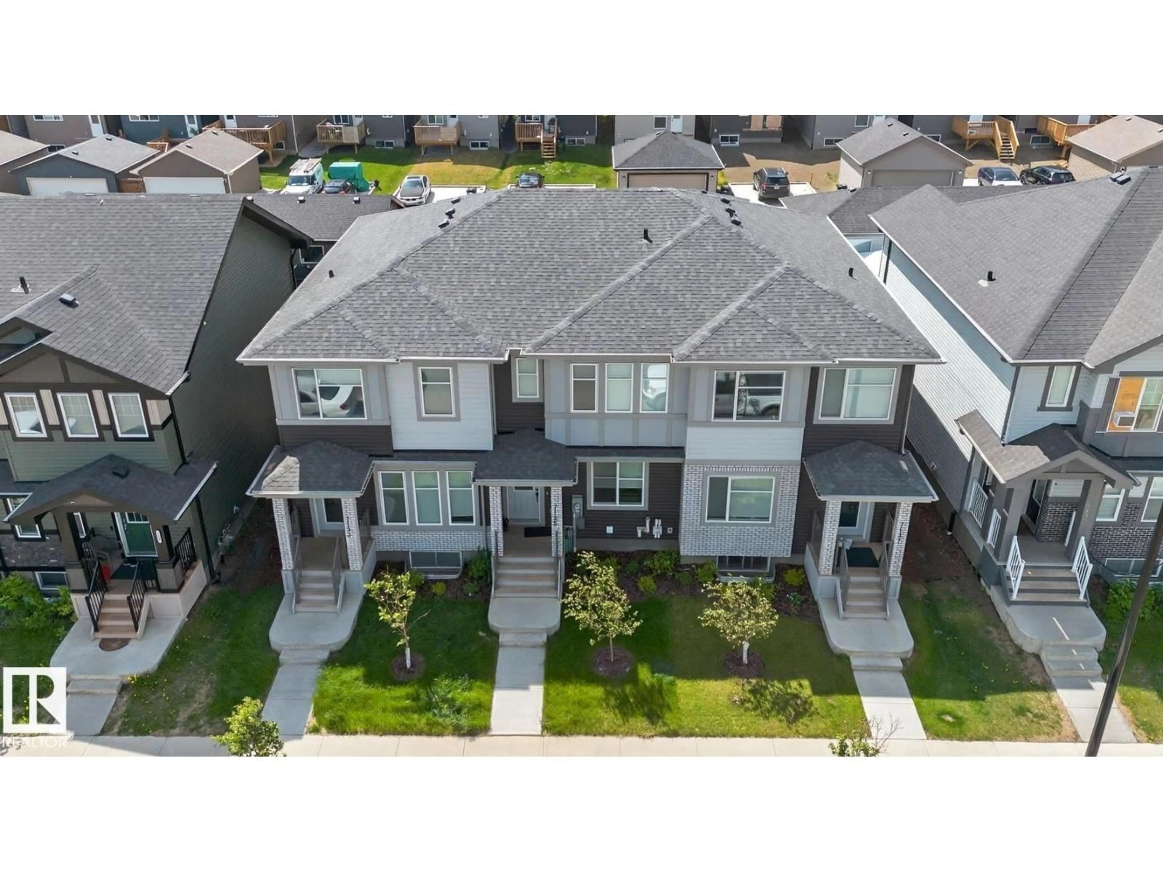 A pic from outside/outdoor area/front of a property/back of a property/a pic from drone, street for 7135 178 AV, Edmonton Alberta T5Z0T8