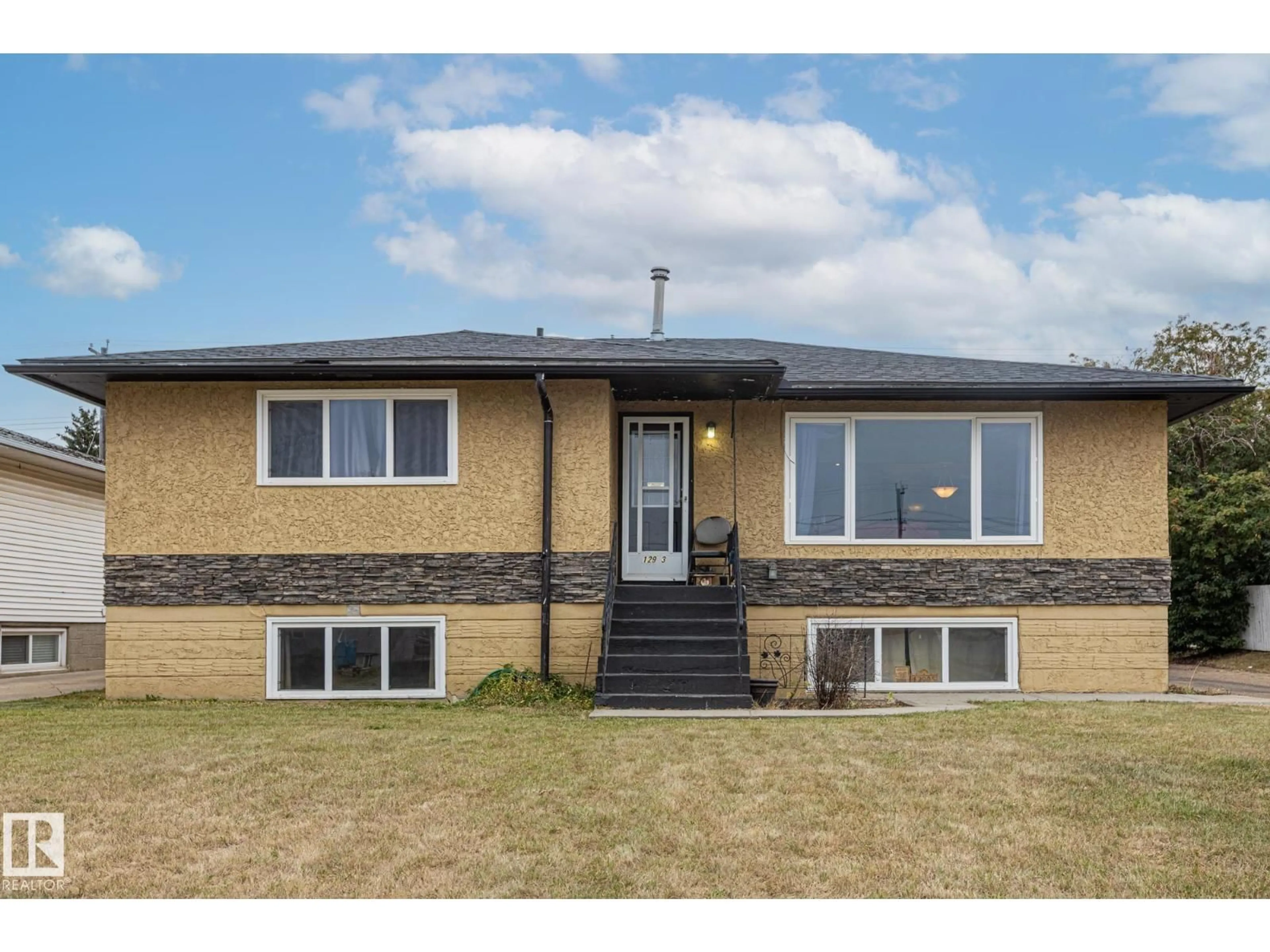 Home with brick exterior material, street for NW - 12903/12905 96 ST, Edmonton Alberta T5E4B2