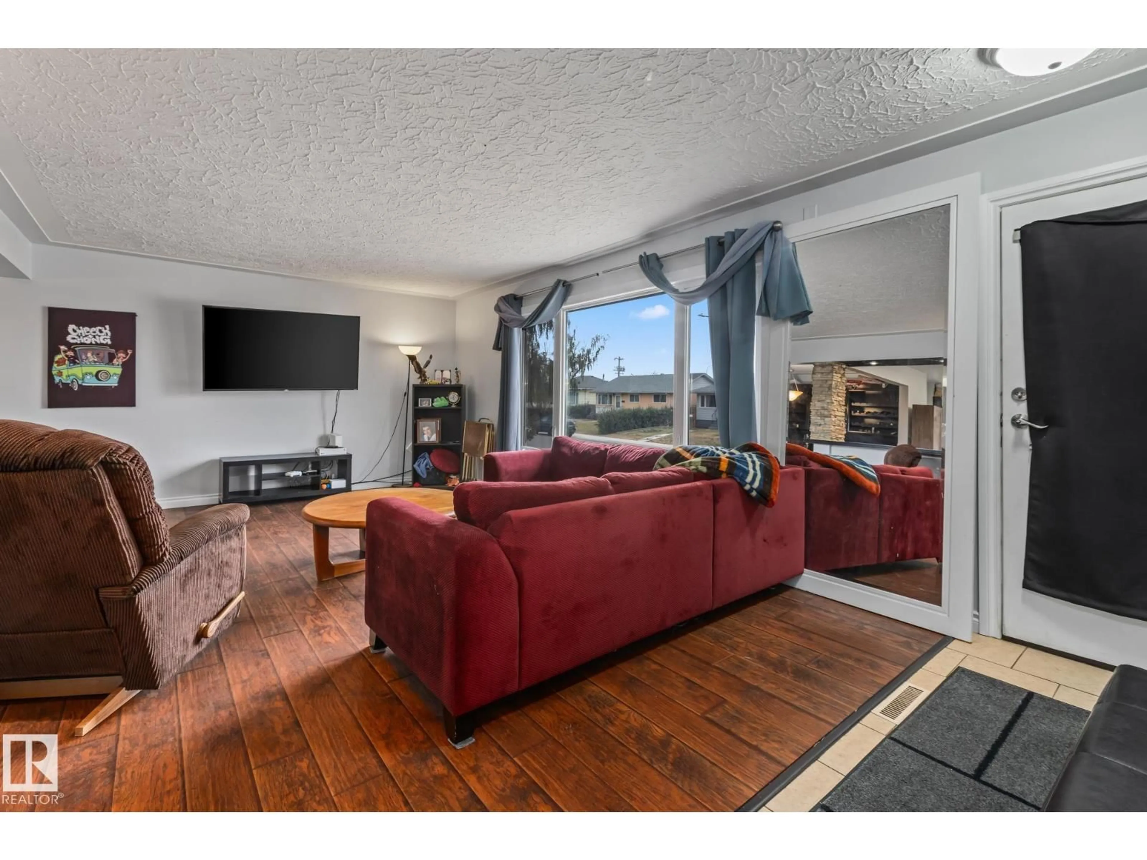 Living room with furniture, unknown for NW - 12903/12905 96 ST, Edmonton Alberta T5E4B2