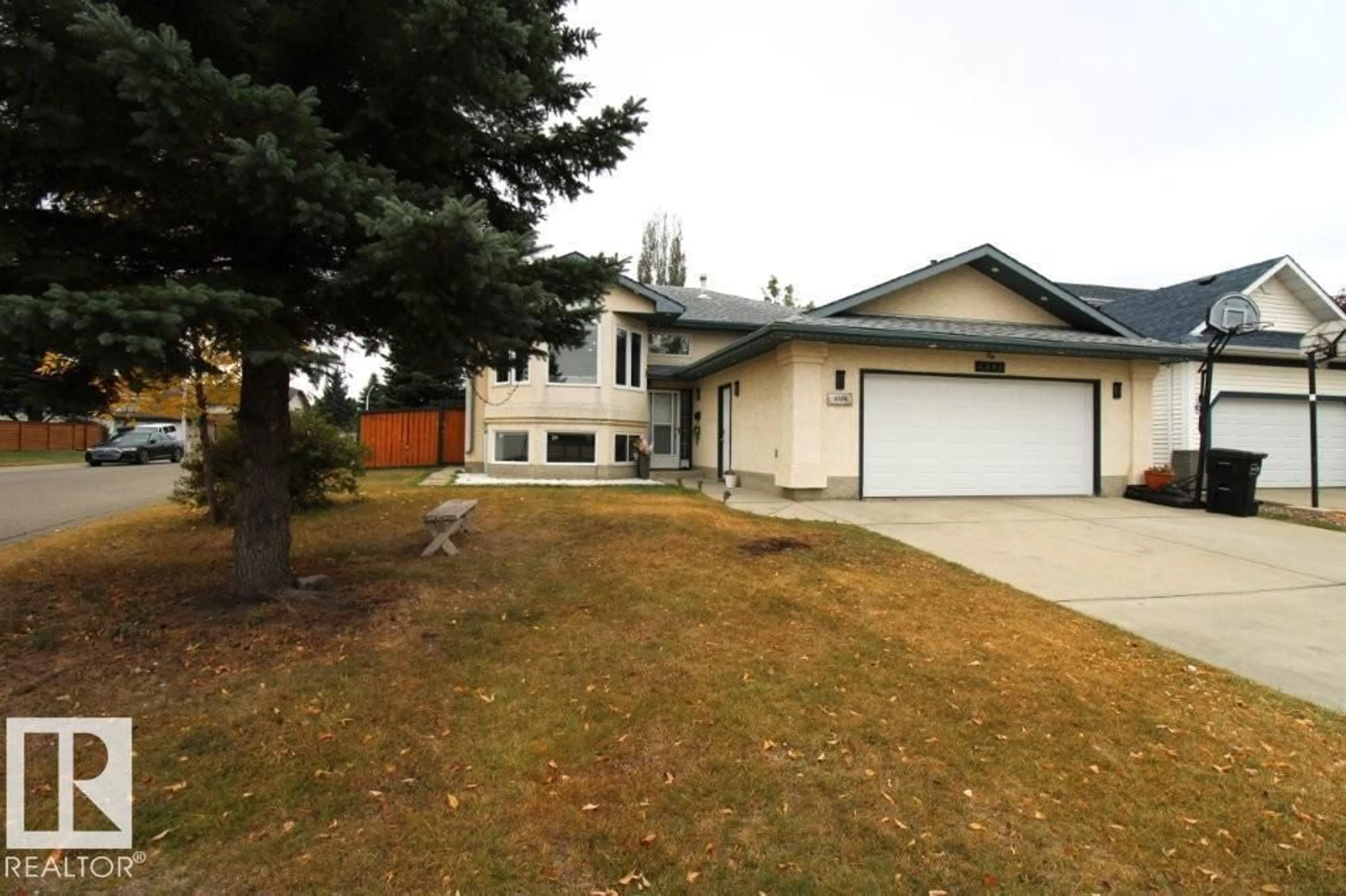 Home with vinyl exterior material, street for NW - 4408 28 ST, Edmonton Alberta T6T1K2