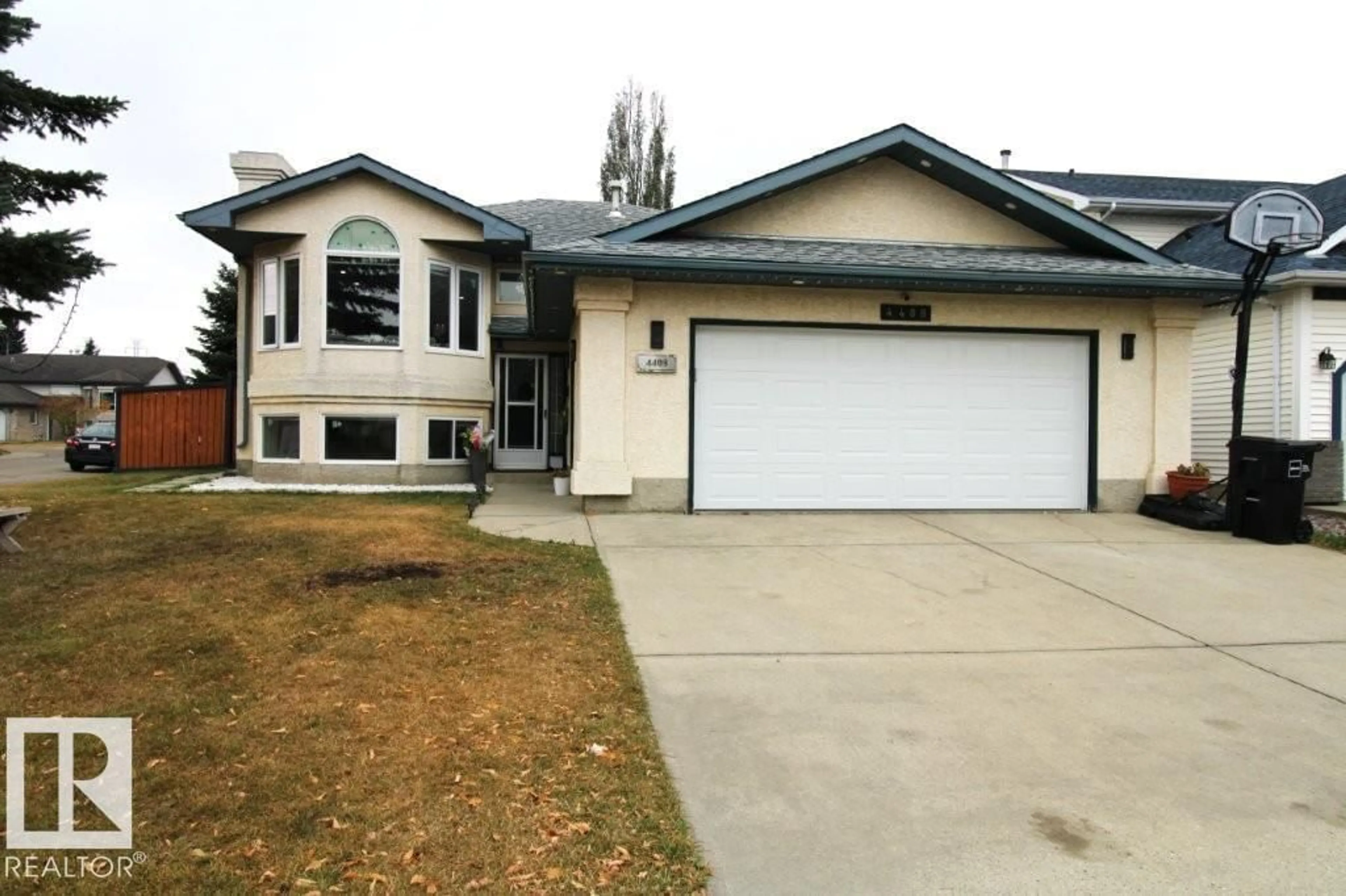Home with vinyl exterior material, street for NW - 4408 28 ST, Edmonton Alberta T6T1K2
