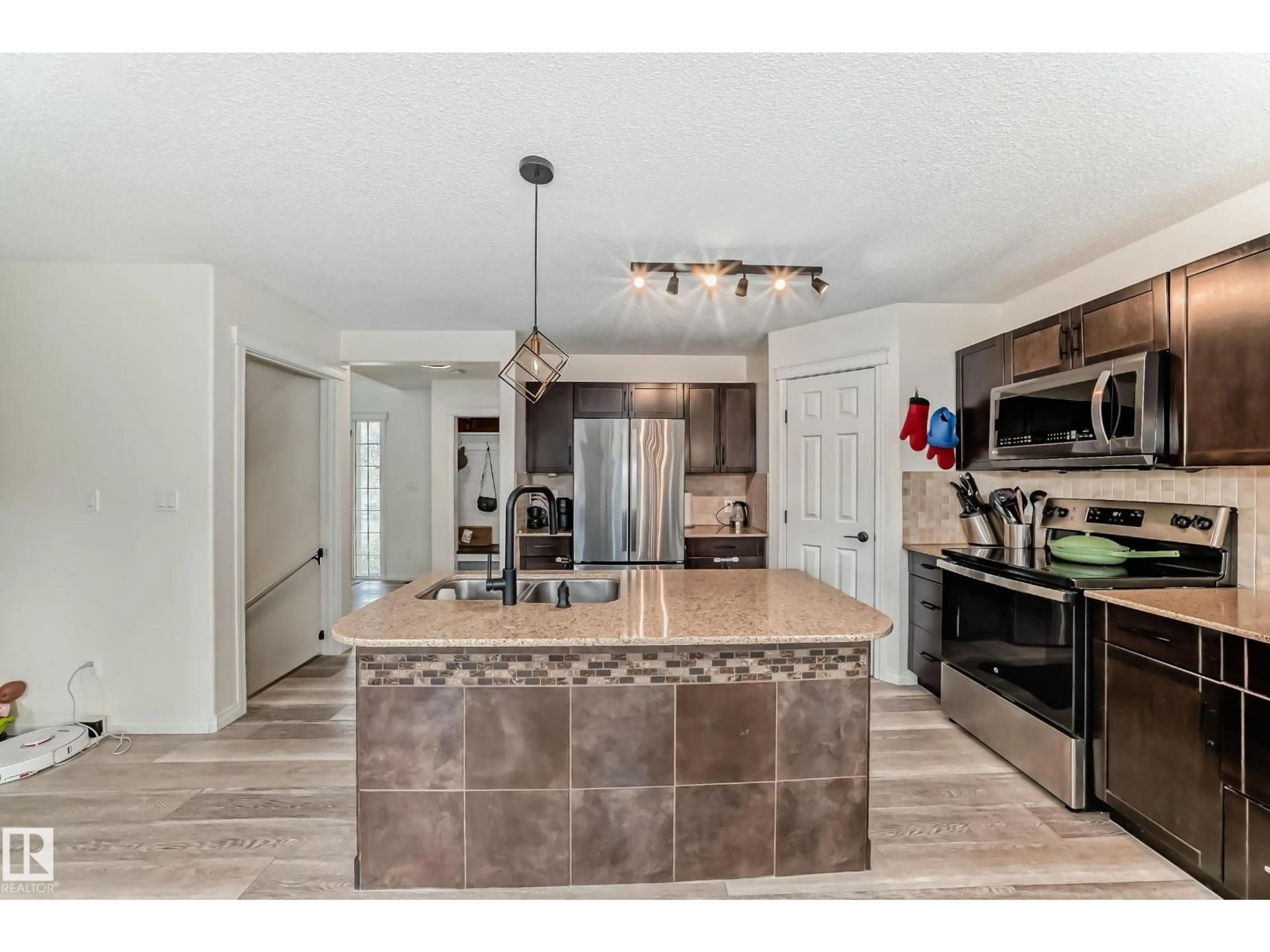 Open concept kitchen, unknown for 34 WISTERIA LN, Fort Saskatchewan Alberta T8L0B4