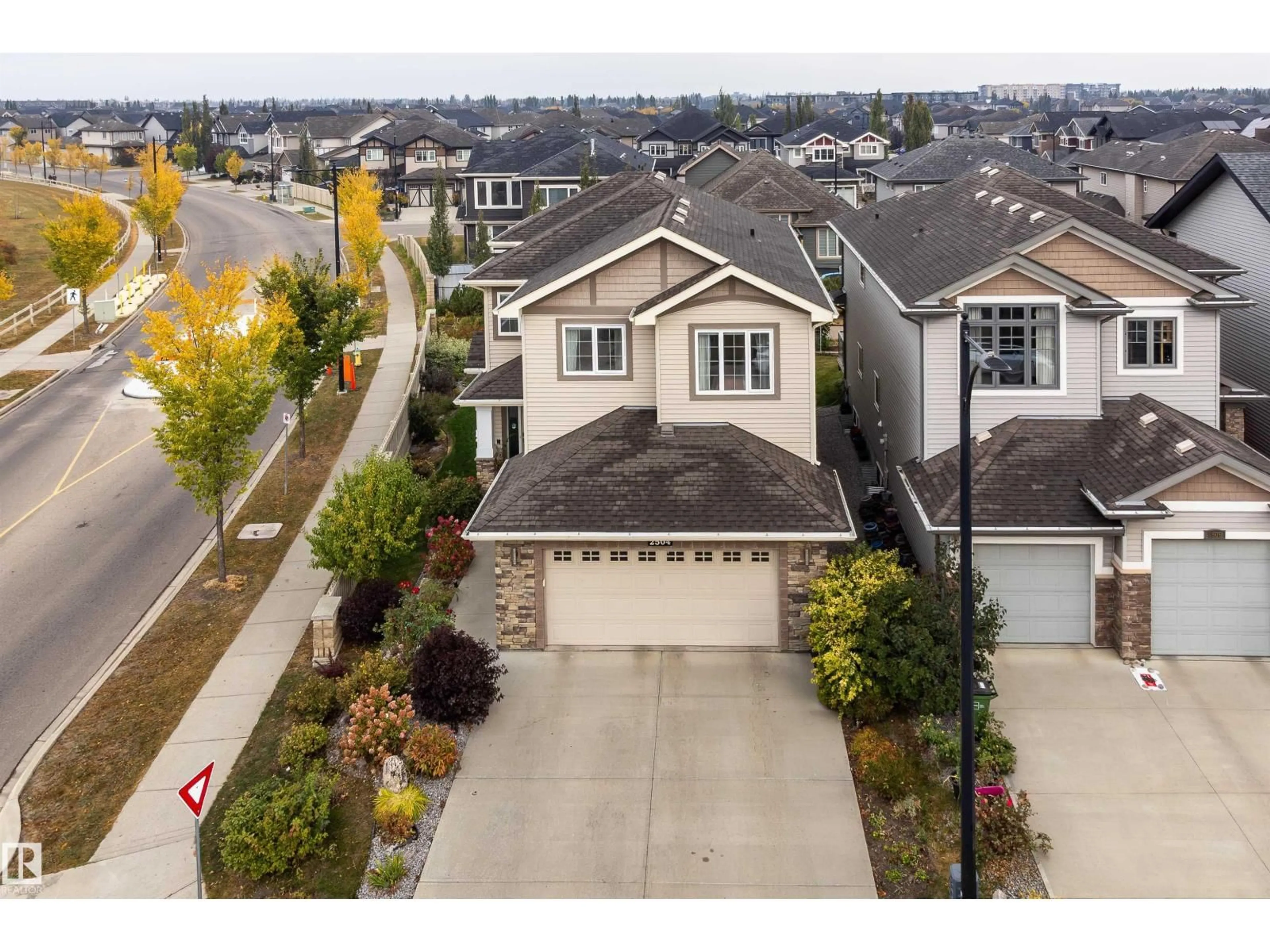 A pic from outside/outdoor area/front of a property/back of a property/a pic from drone, street for 2504 AMERONGEN CR, Edmonton Alberta T6W3C2