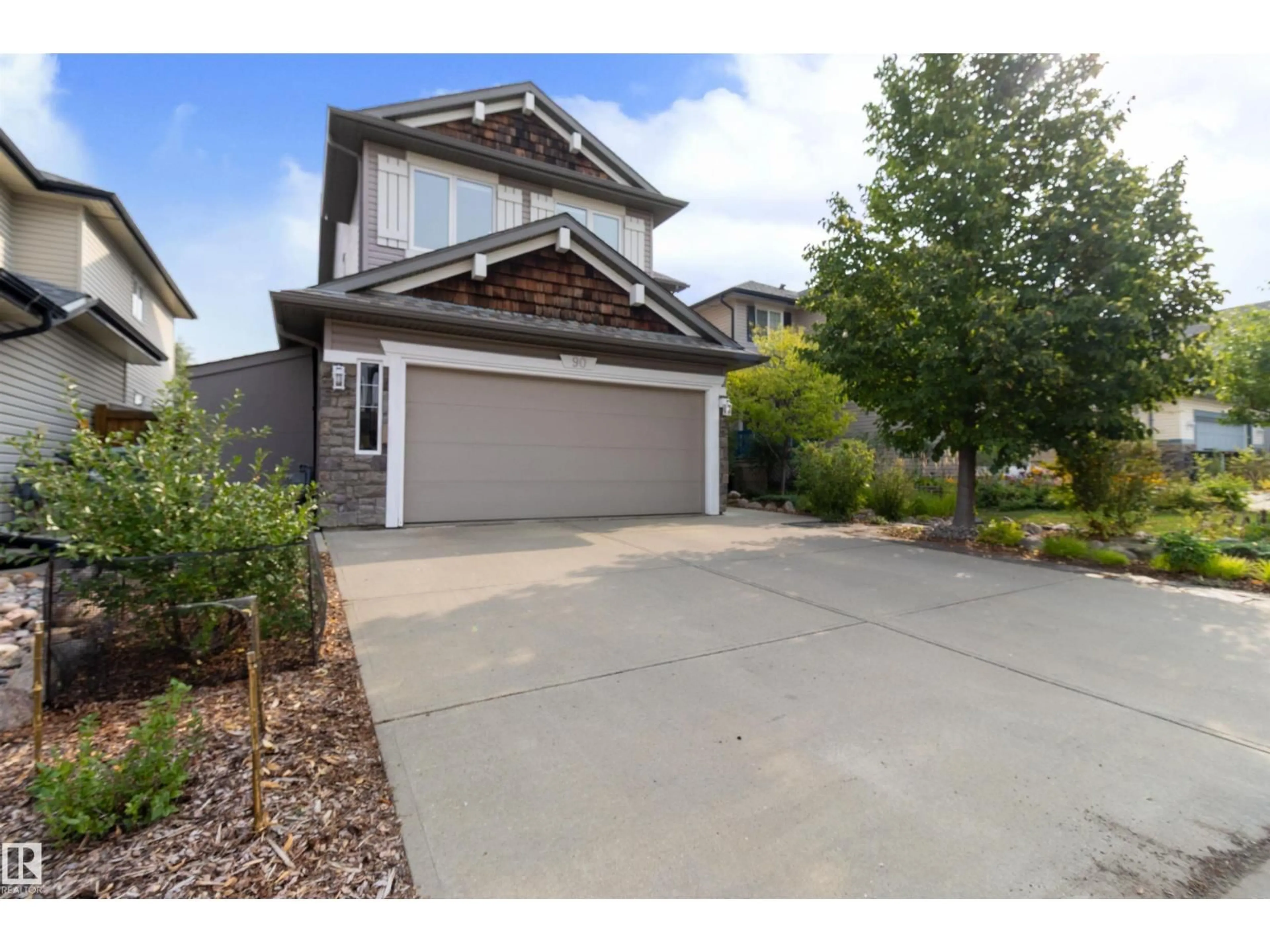 A pic from outside/outdoor area/front of a property/back of a property/a pic from drone, street for 90 CARLYLE CR, Sherwood Park Alberta T8H2T8