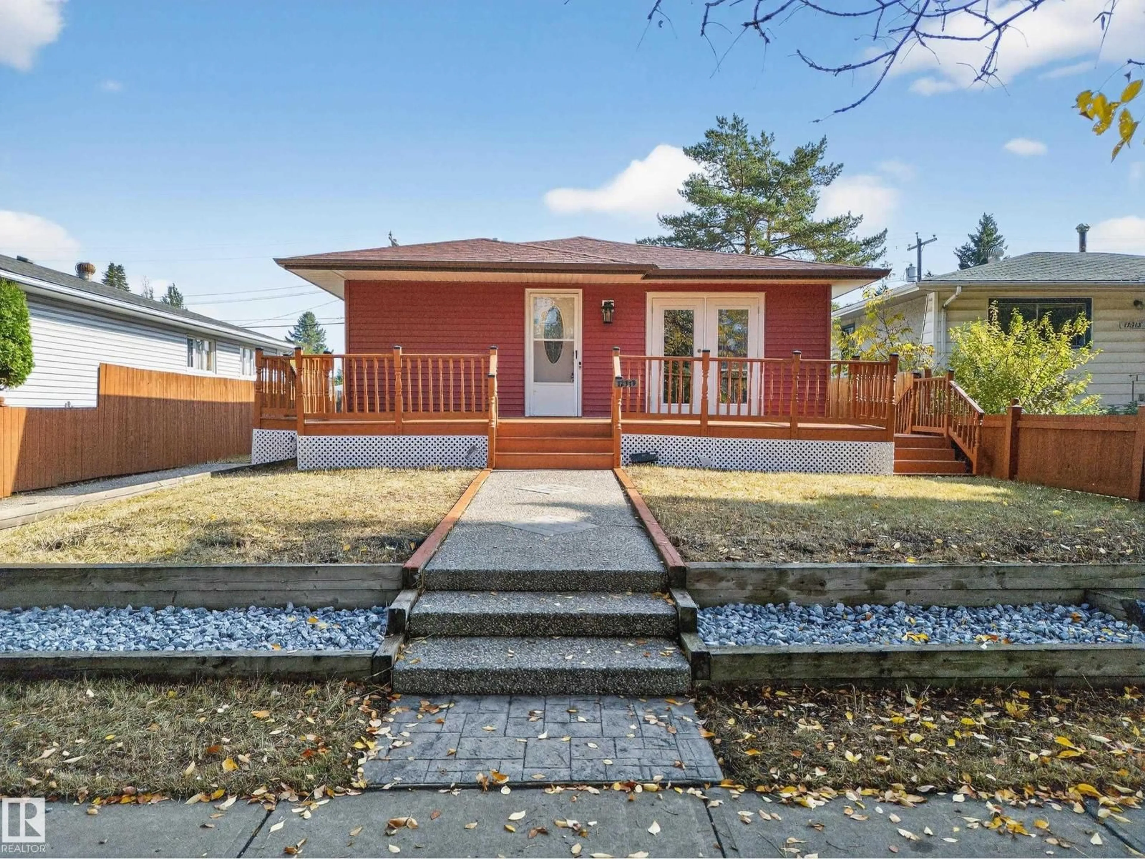 Home with vinyl exterior material, street for NW - 12919 113A ST, Edmonton Alberta T5E5B4