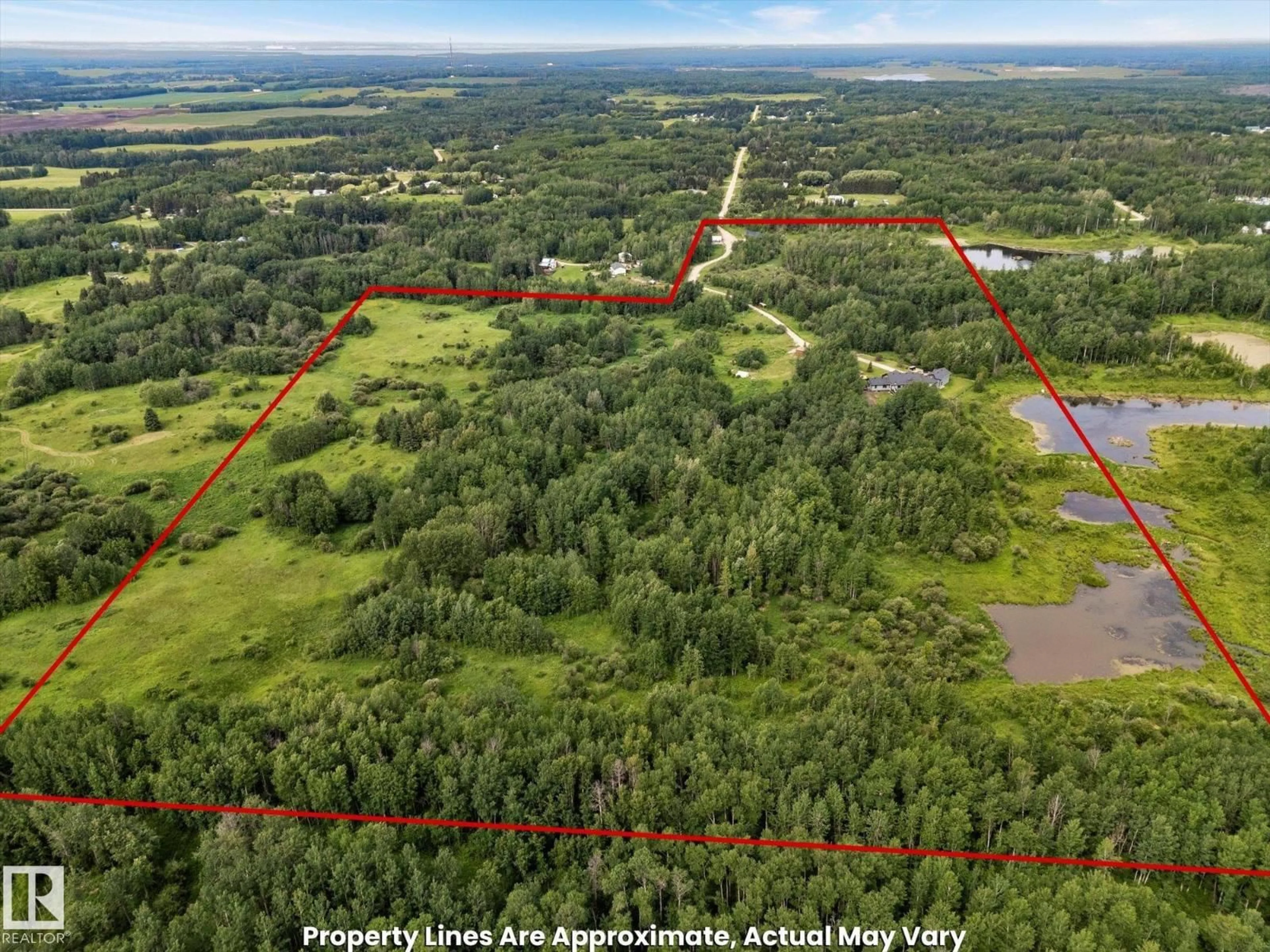A pic from outside/outdoor area/front of a property/back of a property/a pic from drone, forest/trees view for 53313 RGE ROAD 30, Rural Parkland County Alberta T7Y0E2