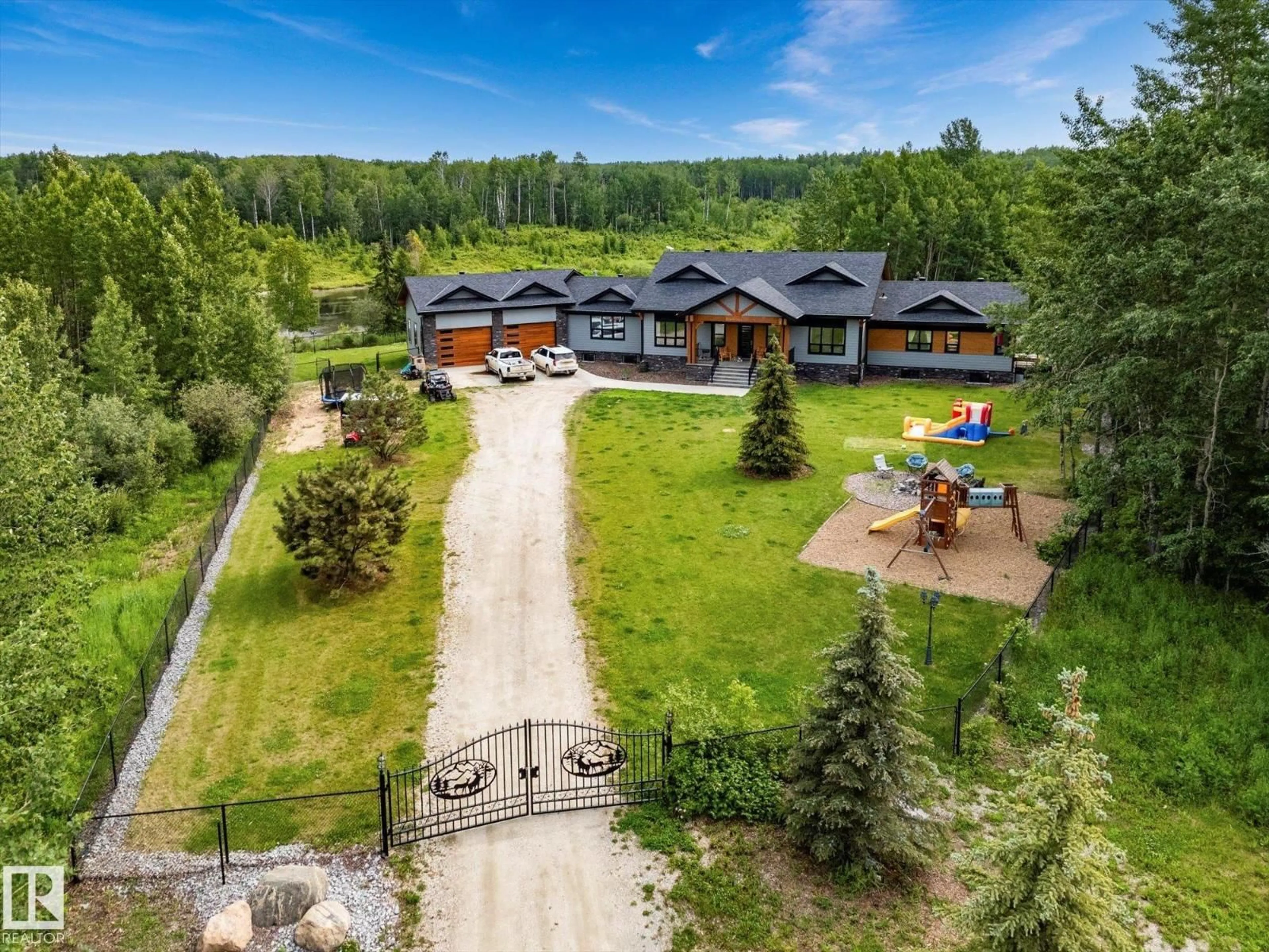 A pic from outside/outdoor area/front of a property/back of a property/a pic from drone, unknown for 53313 RGE ROAD 30, Rural Parkland County Alberta T7Y0E2