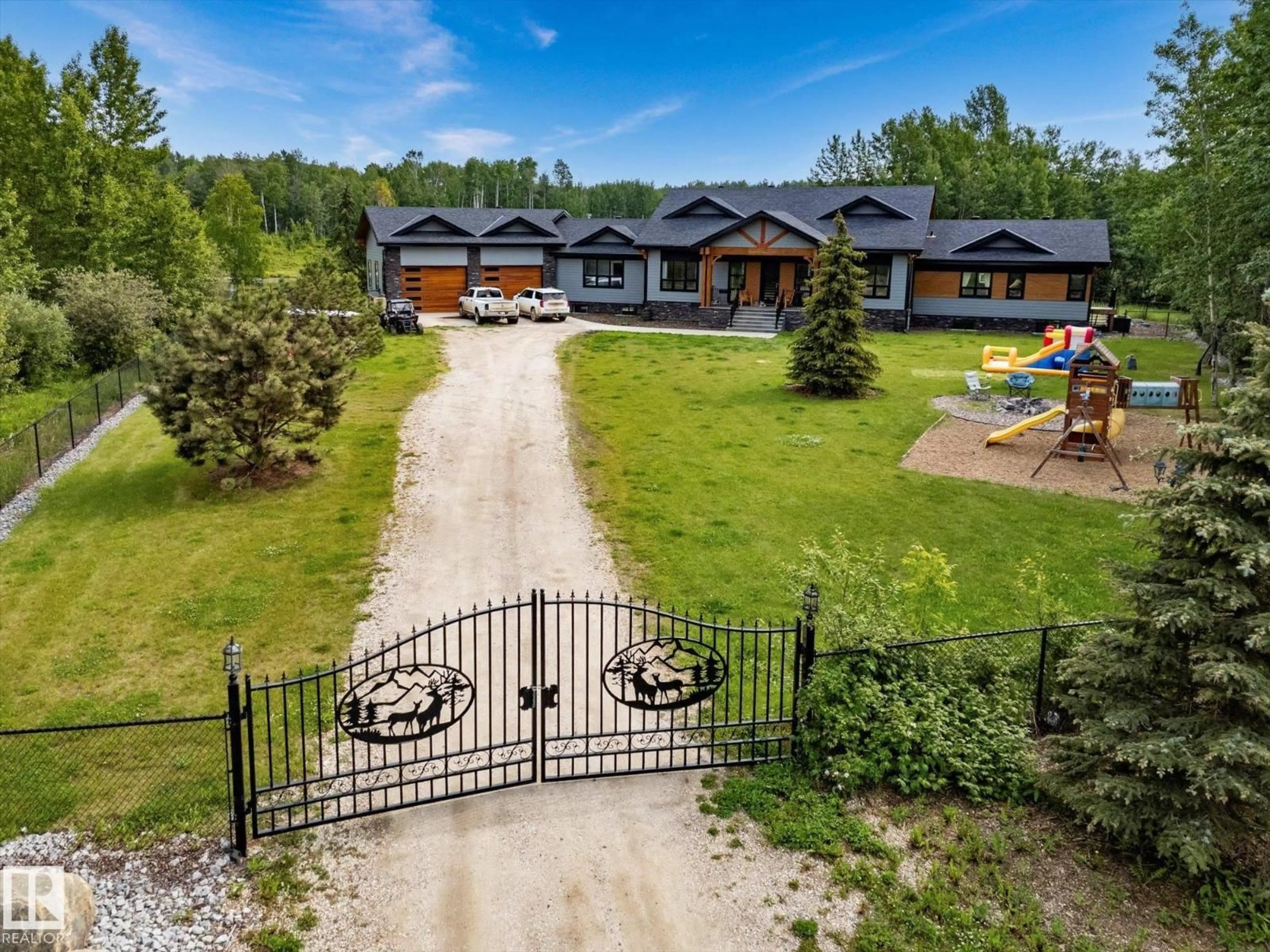 A pic from outside/outdoor area/front of a property/back of a property/a pic from drone, mountain view for 53313 RGE ROAD 30, Rural Parkland County Alberta T7Y0E2