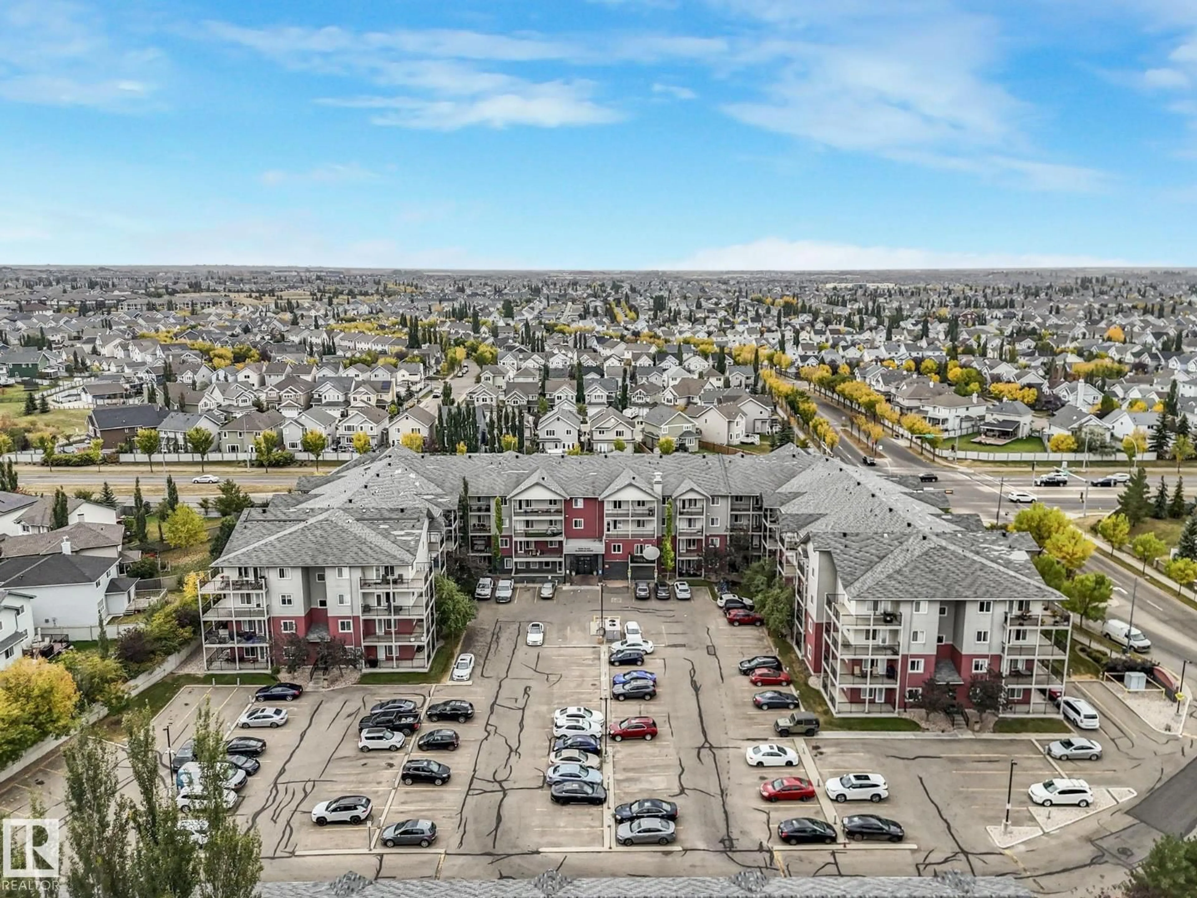 A pic from outside/outdoor area/front of a property/back of a property/a pic from drone, mountain view for 111 - 326 EDWARDS DR, Edmonton Alberta T6X0C4