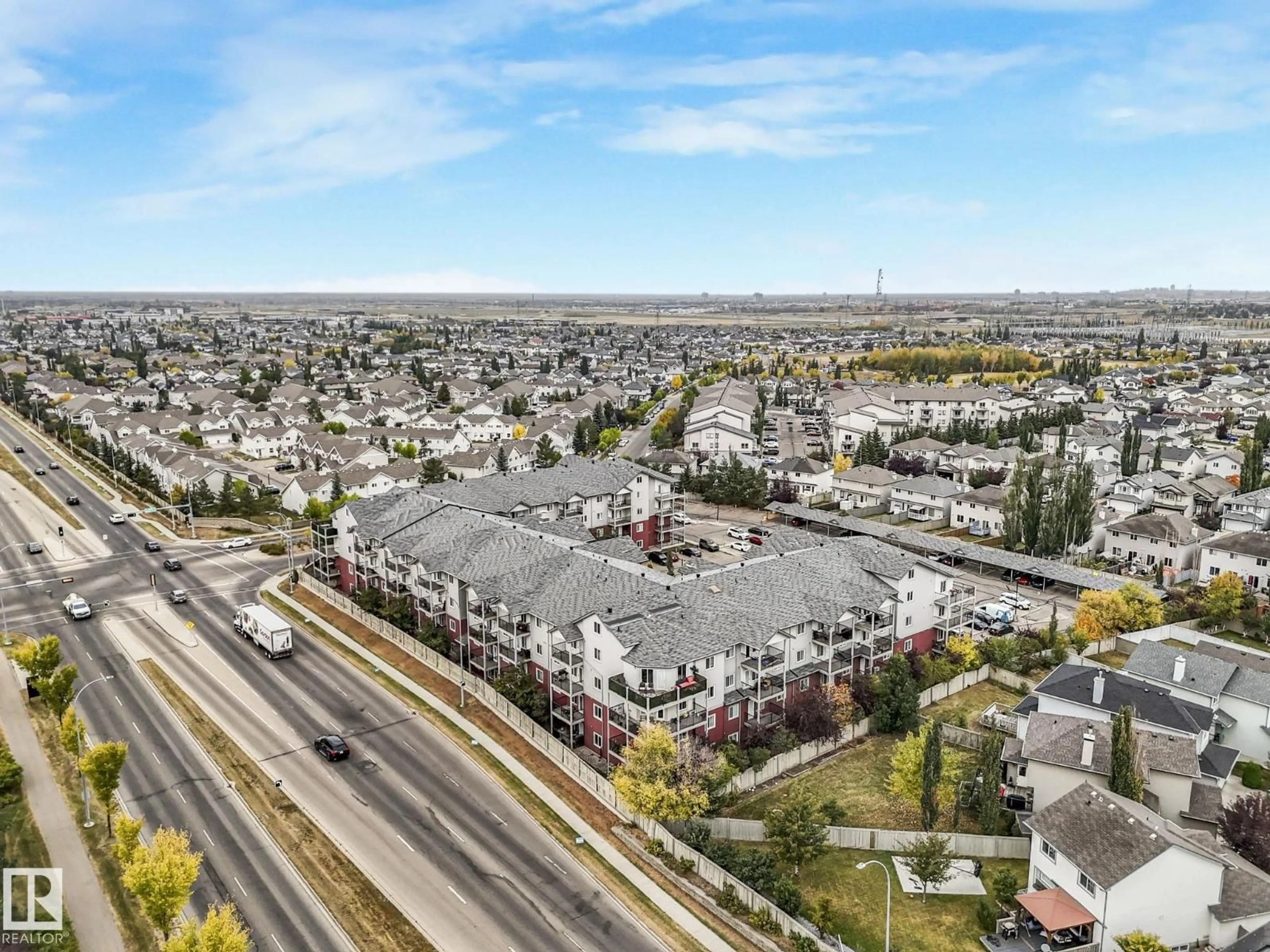 A pic from outside/outdoor area/front of a property/back of a property/a pic from drone, unknown for 111 - 326 EDWARDS DR, Edmonton Alberta T6X0C4